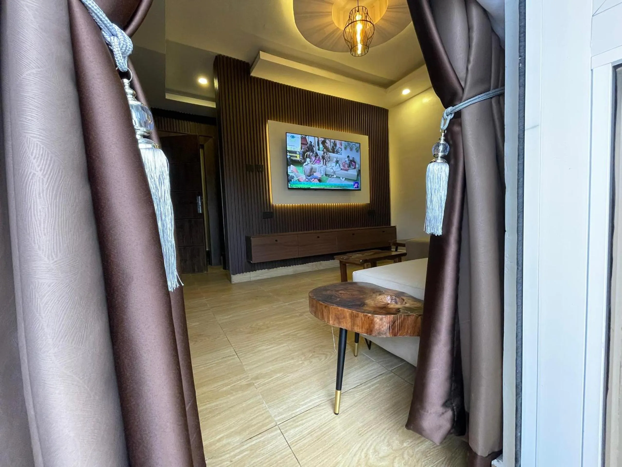 Communal lounge/ TV room in Presken Hotel Residence, GRA Ikeja, Lagos