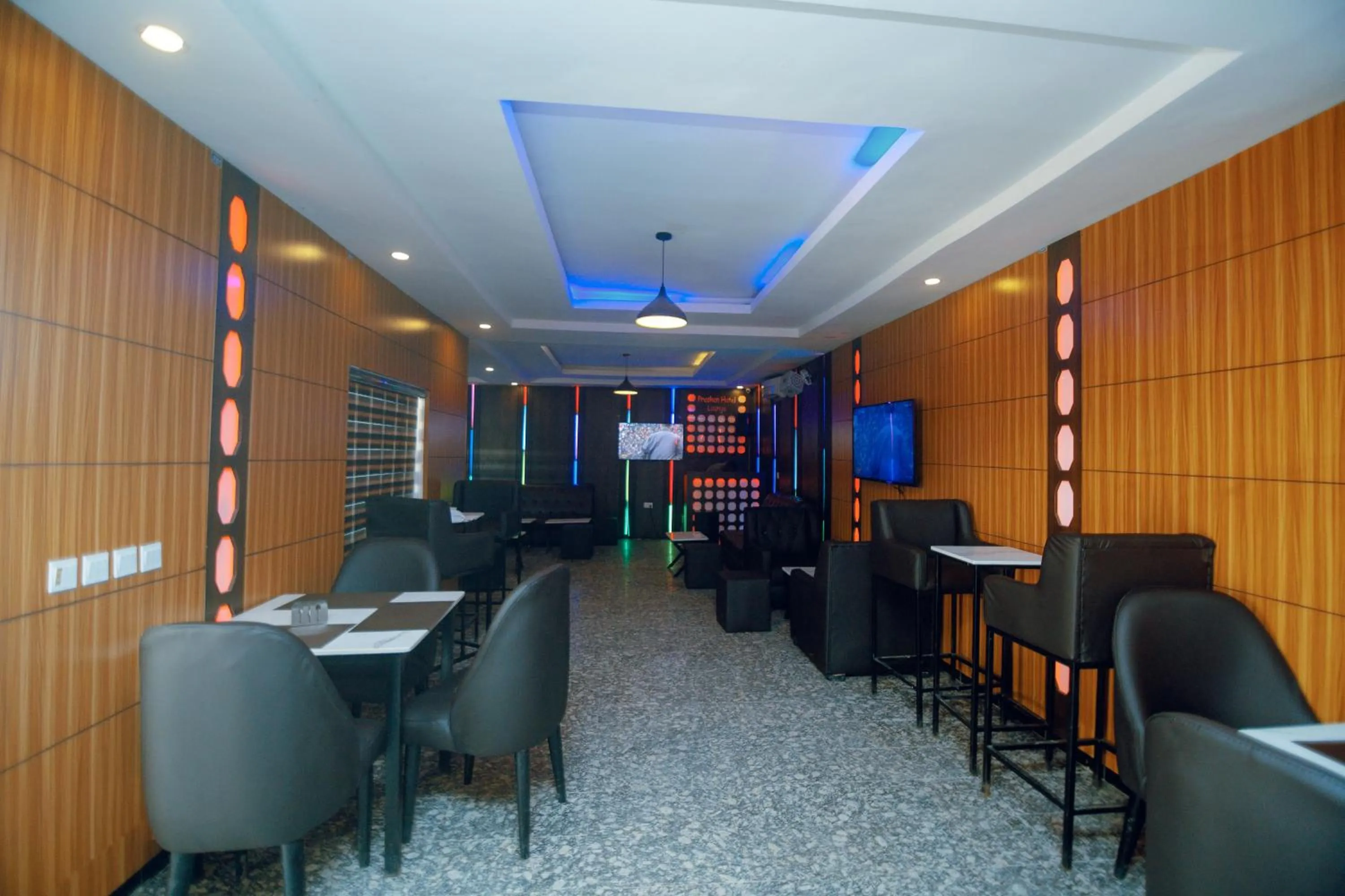 Communal lounge/ TV room in Presken Hotel Residence, GRA Ikeja, Lagos