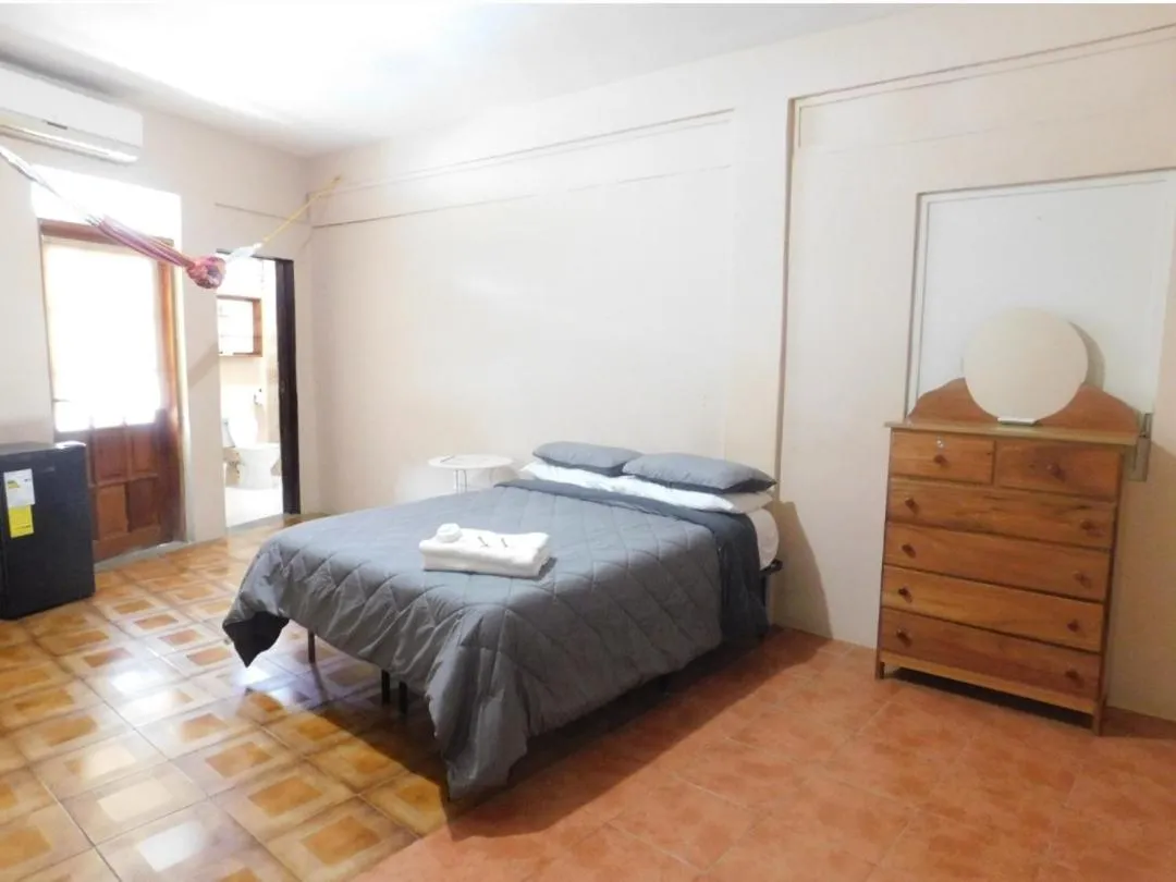 Bed in Arnold's Guest House