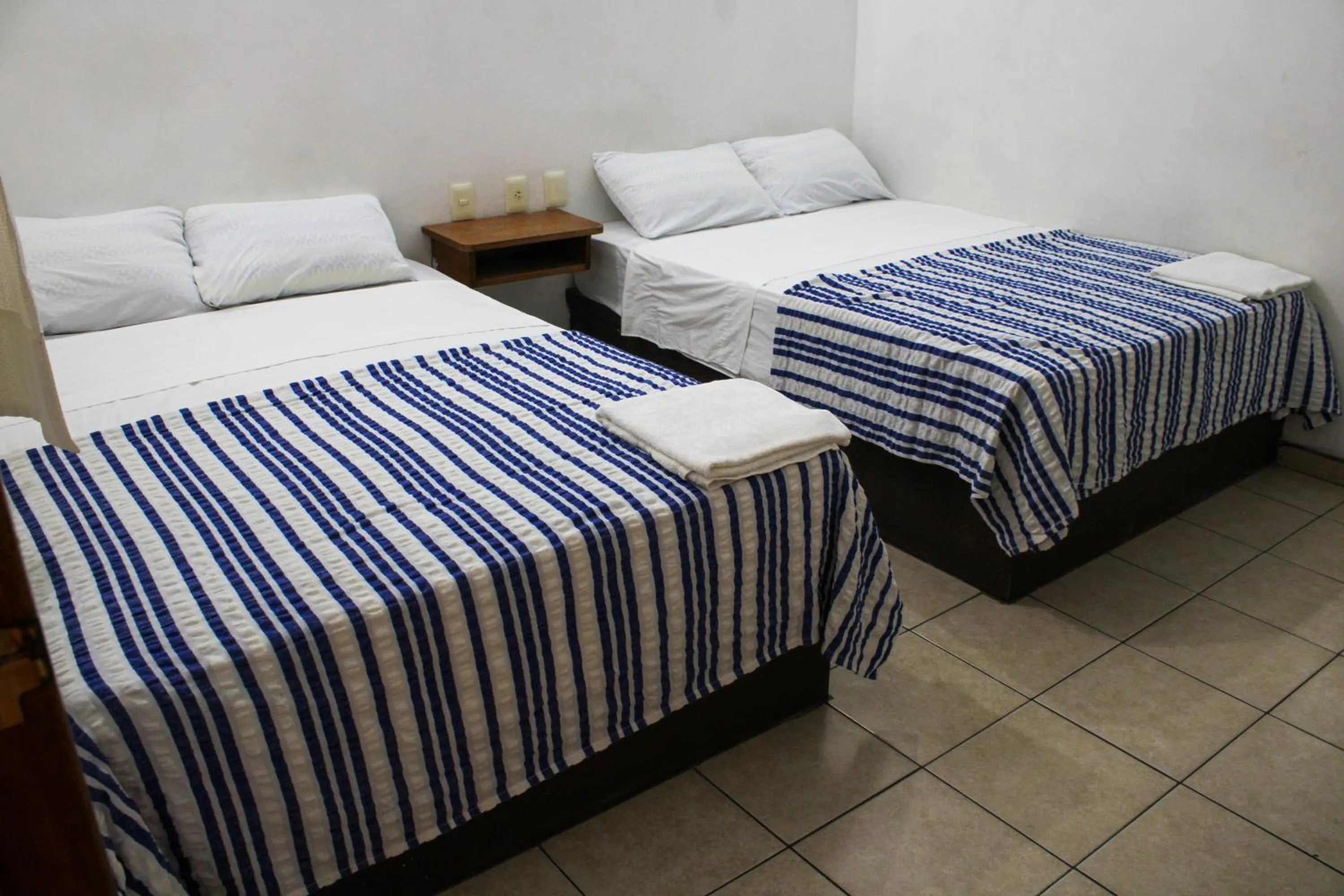 Bed in Hotel OM DownTown