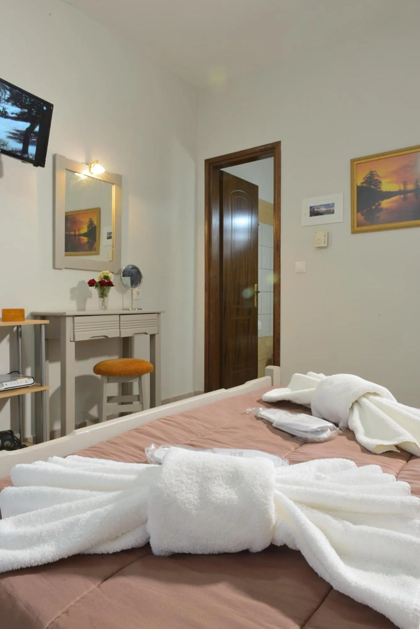 Bed in Artemis Apartments