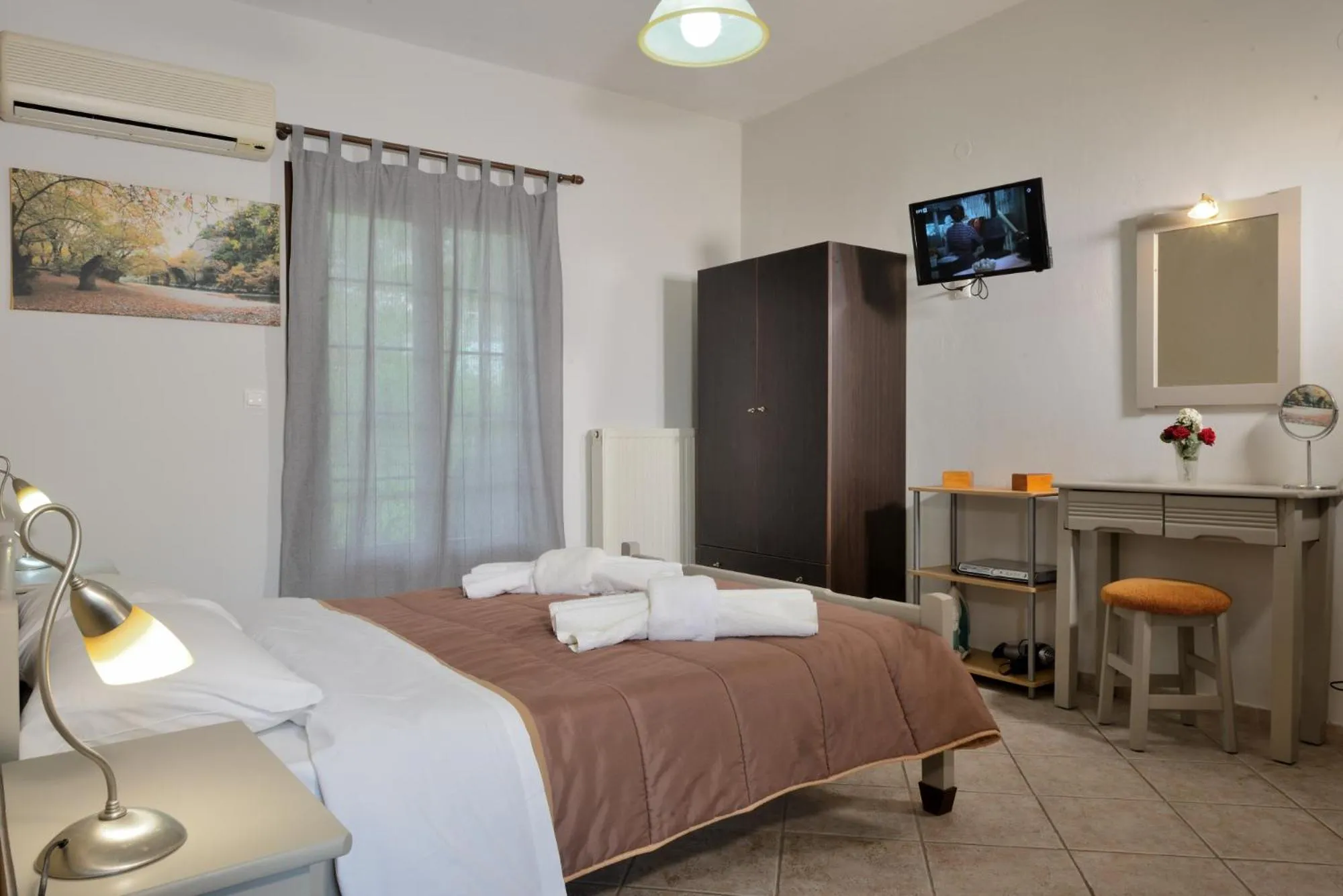 Bed in Artemis Apartments