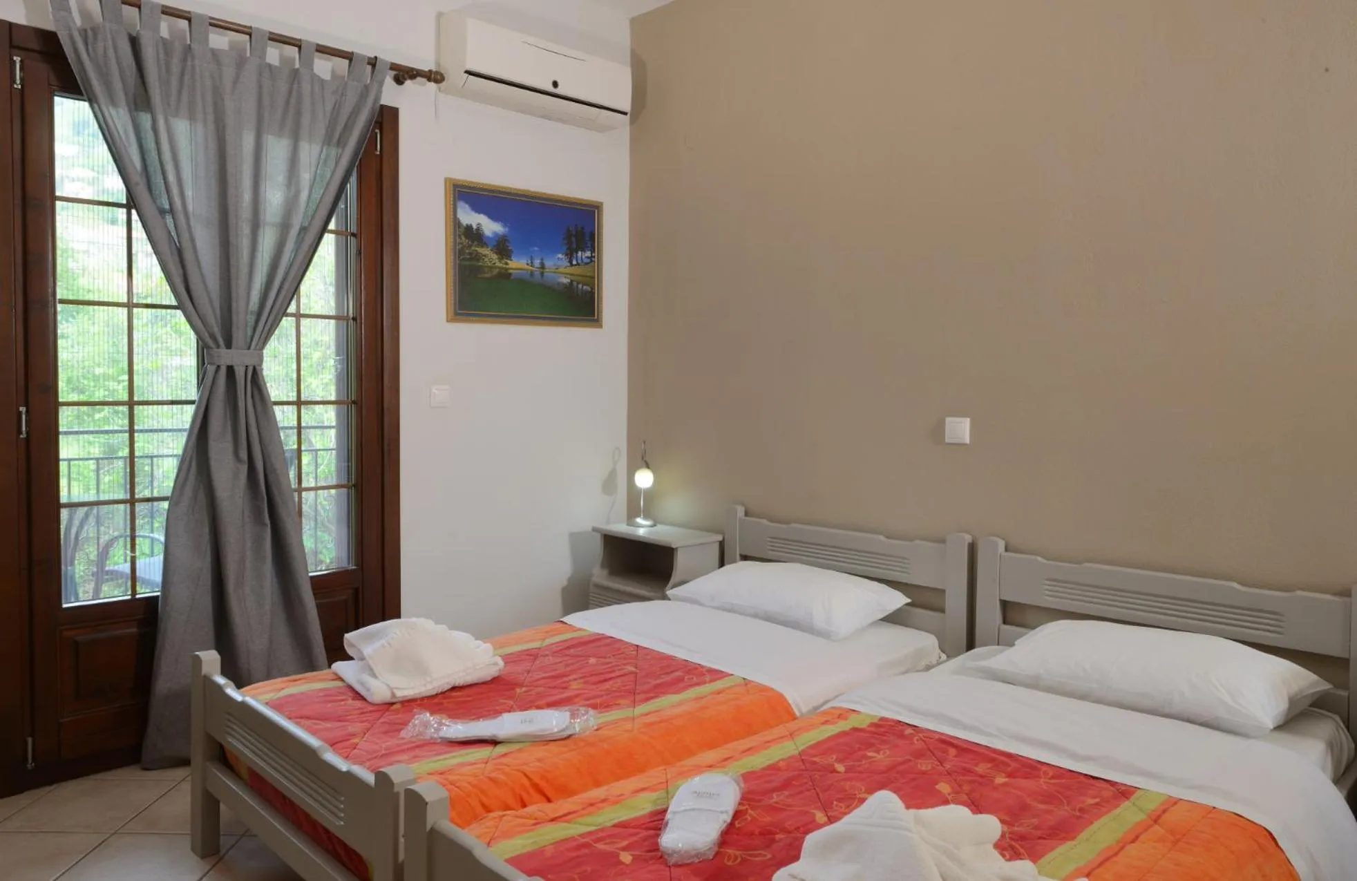 Bed in Artemis Apartments