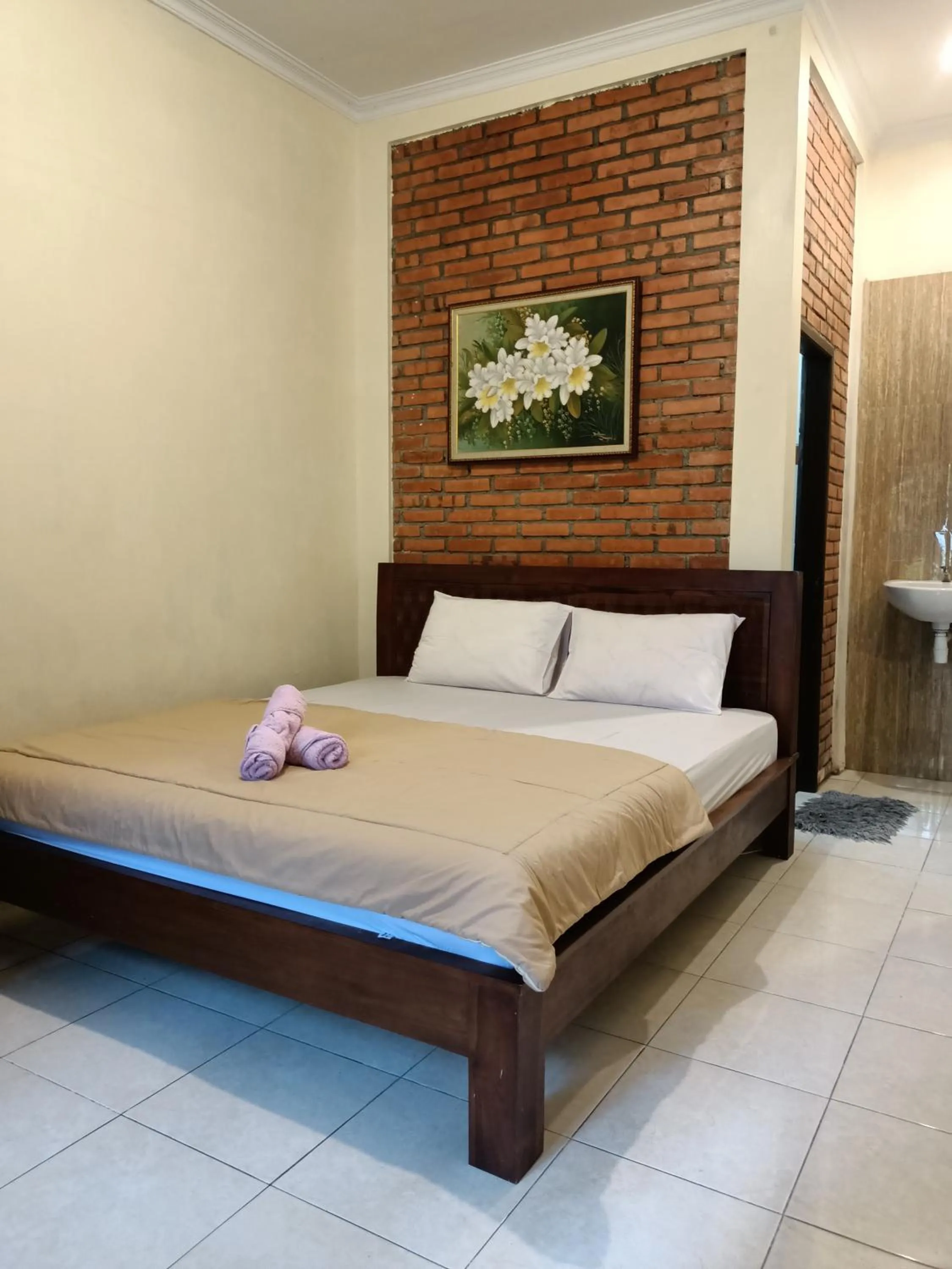 Bed in Rumah Kami Guest House