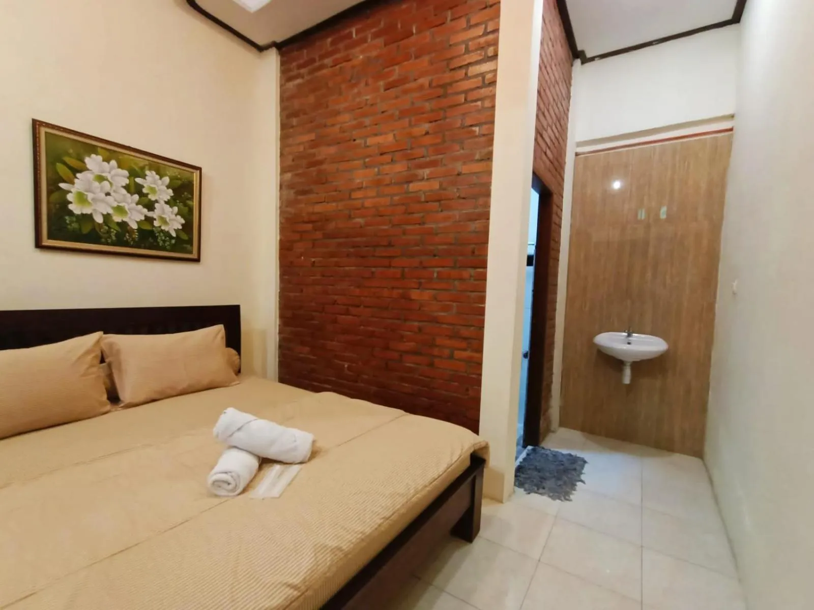 Bed in Rumah Kami Guest House
