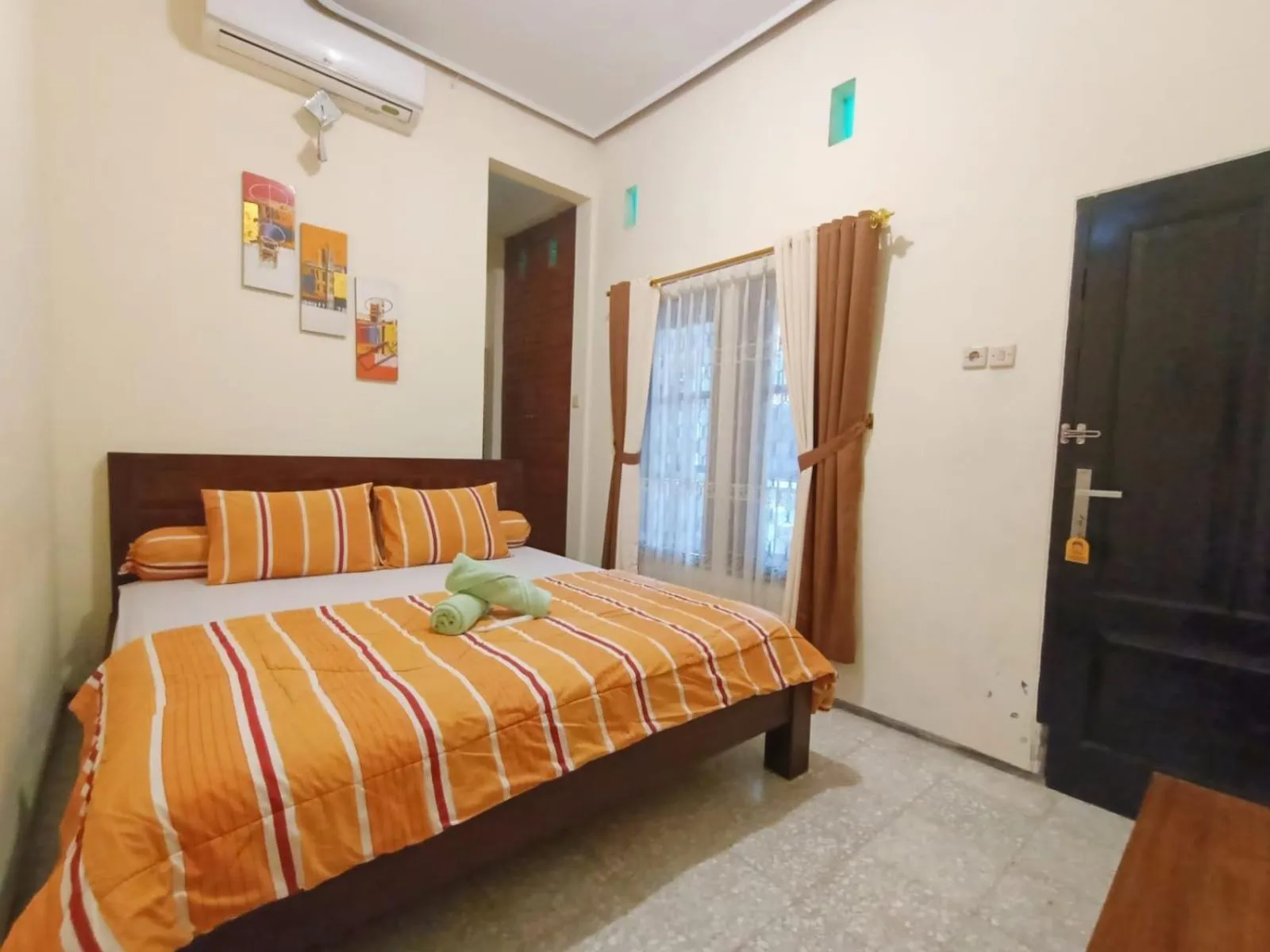 Bed in Rumah Kami Guest House