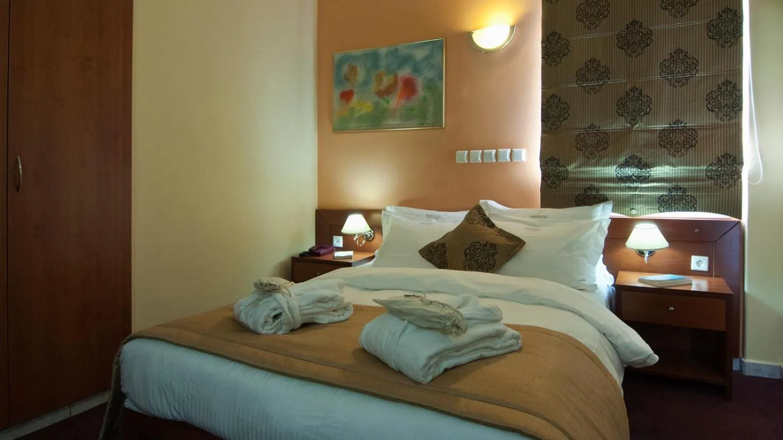 Bed in Triton Hotel Piraeus