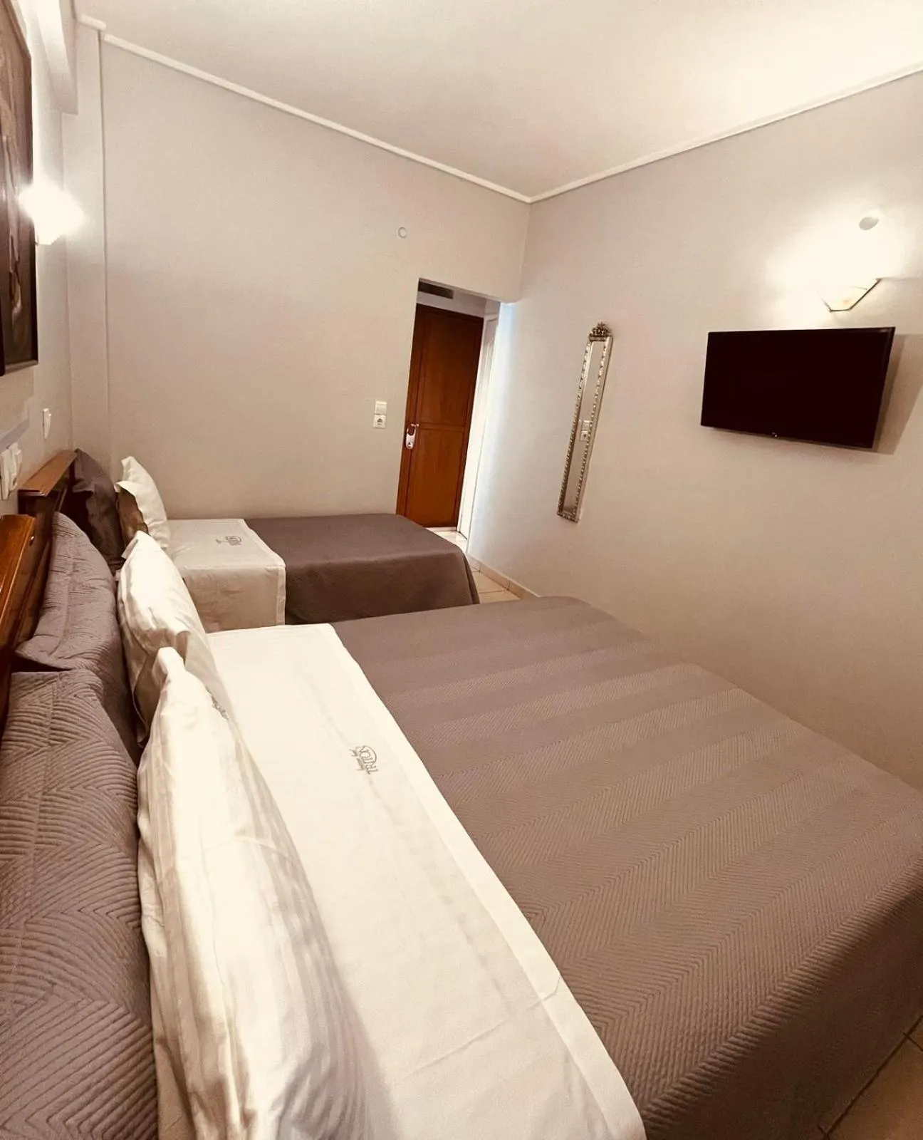 Bed in Triton Hotel Piraeus