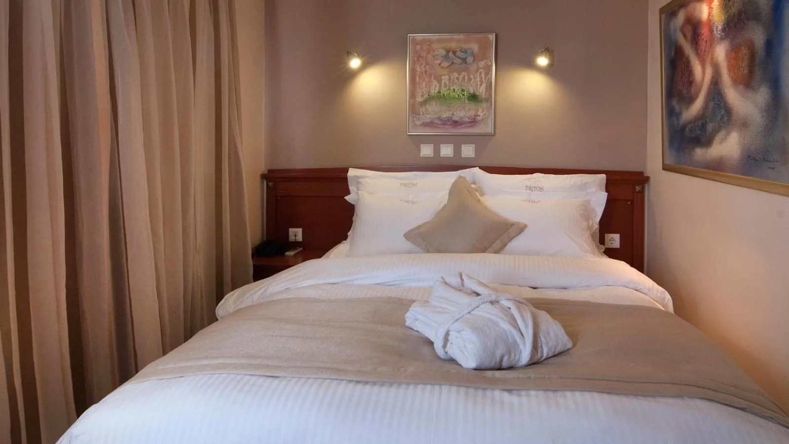 Bed in Triton Hotel Piraeus