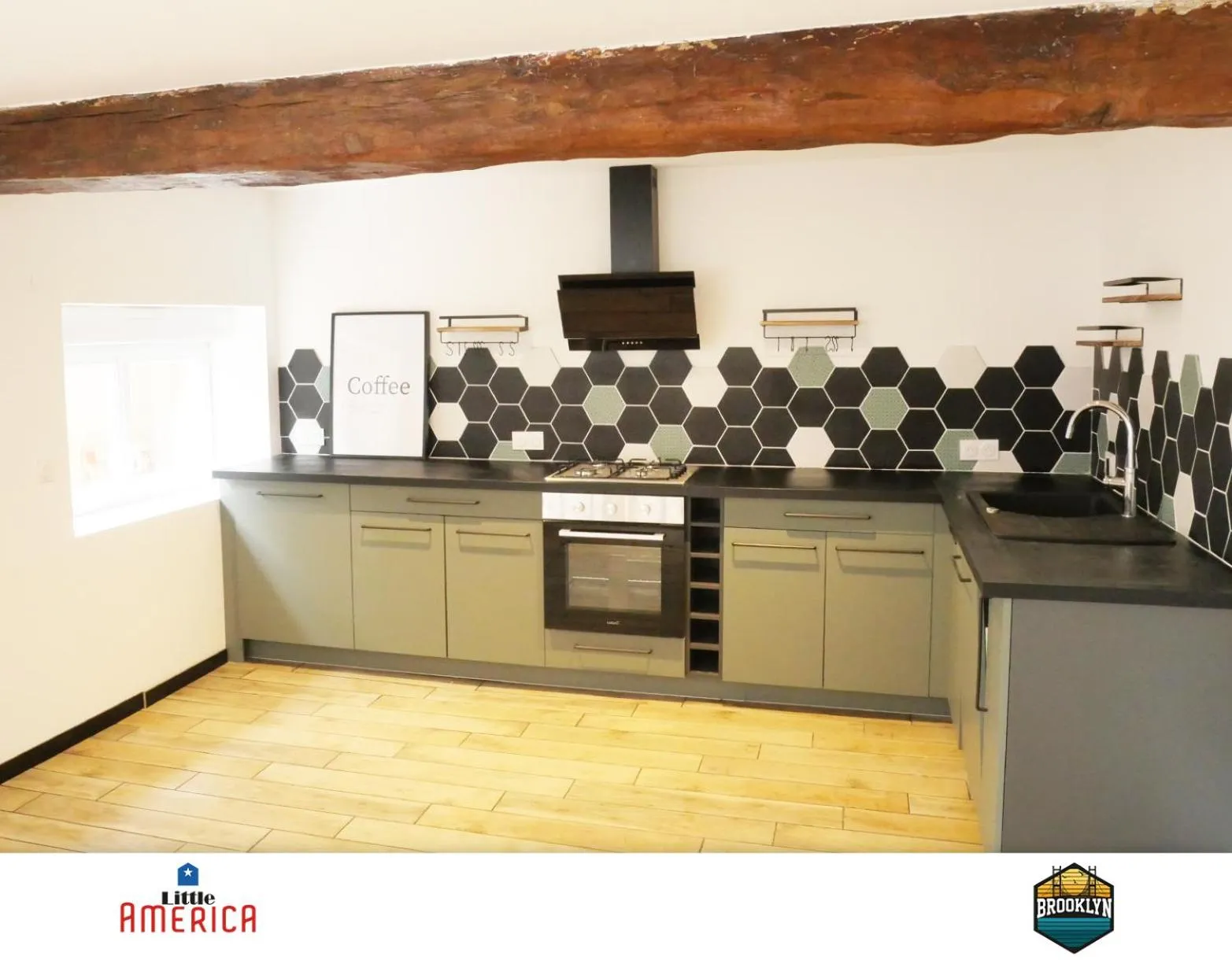 Kitchen or kitchenette in Little America - Appart Hôtel 3km Futuroscope