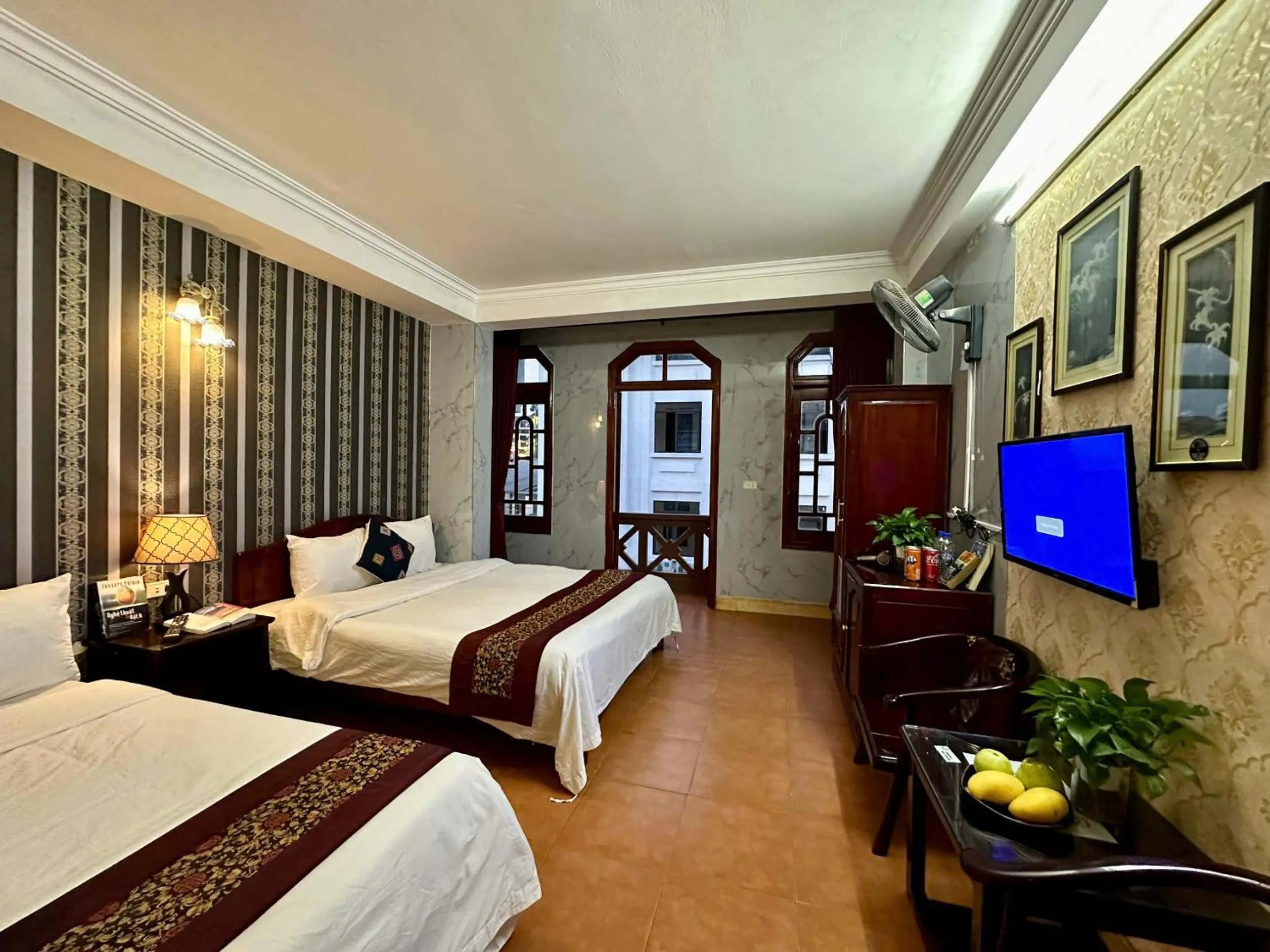 Communal lounge/ TV room, Bed in Hà Giang Hotel Sapa