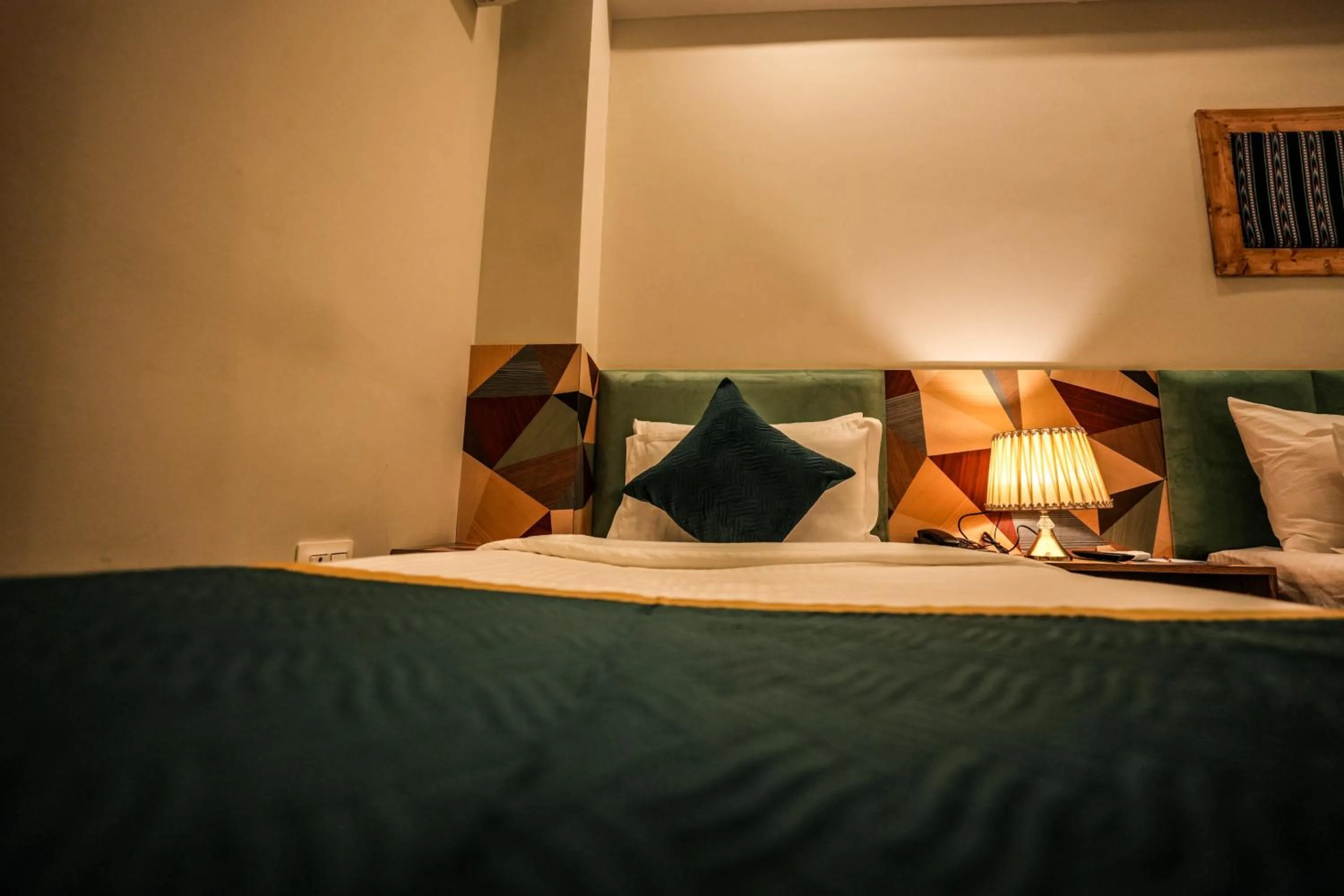 Bed in Hotel Square One by D'Polo Dharamshala