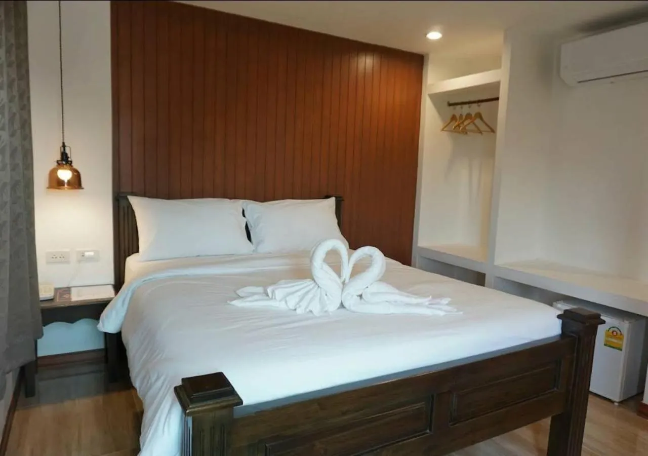 Bed in Lanna Haven Hotel