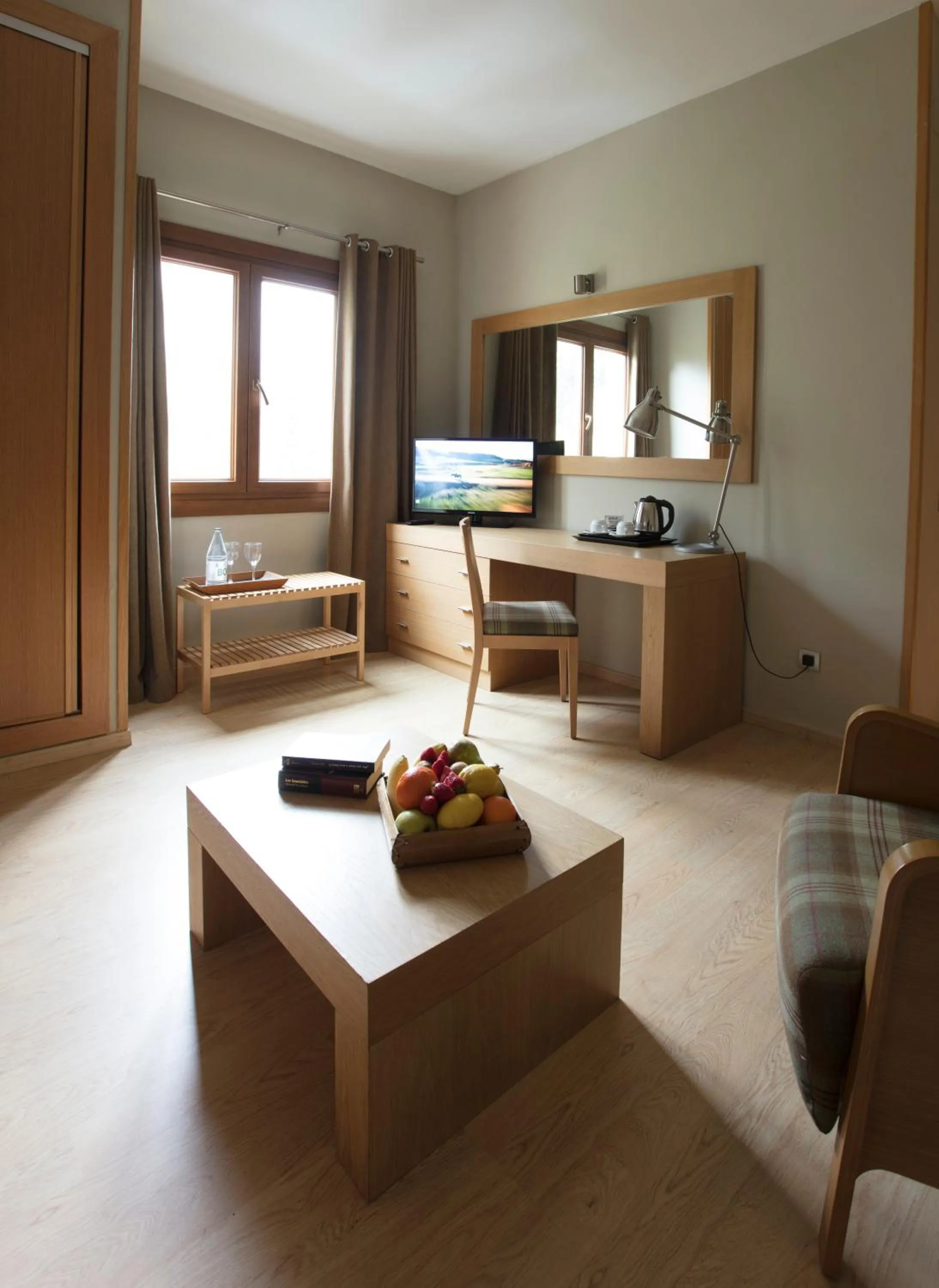 Communal lounge/ TV room in Hotel Manantial