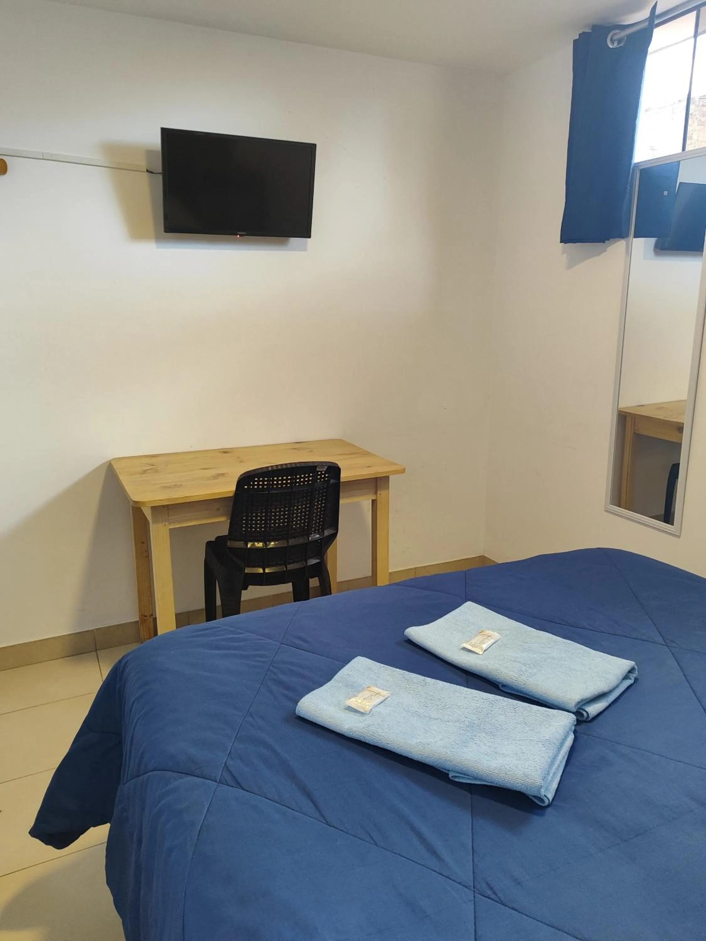 TV and multimedia, Bed in La Pascana Hospedaje