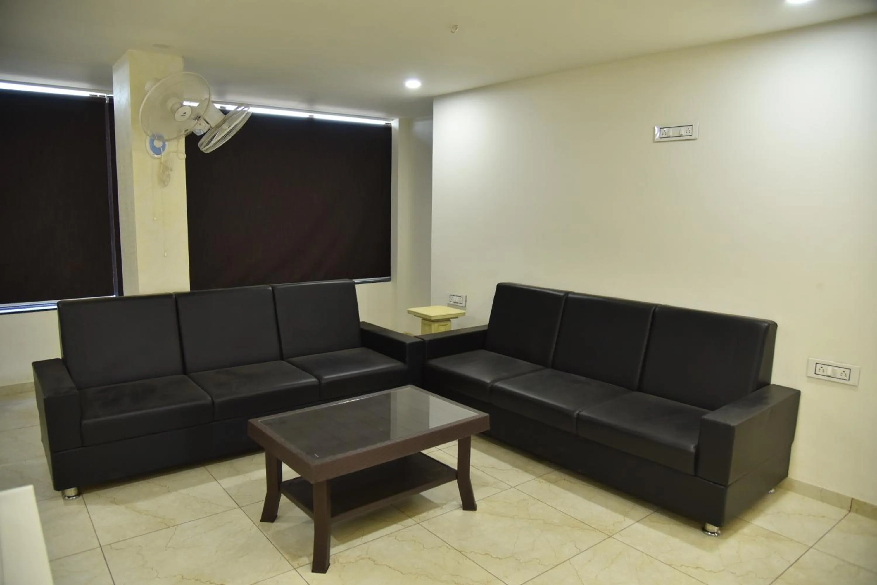 Seating area in Hotel Savera Inn