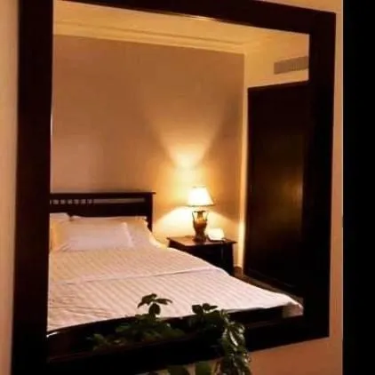 Bedroom in Tamrah Suites Hotel