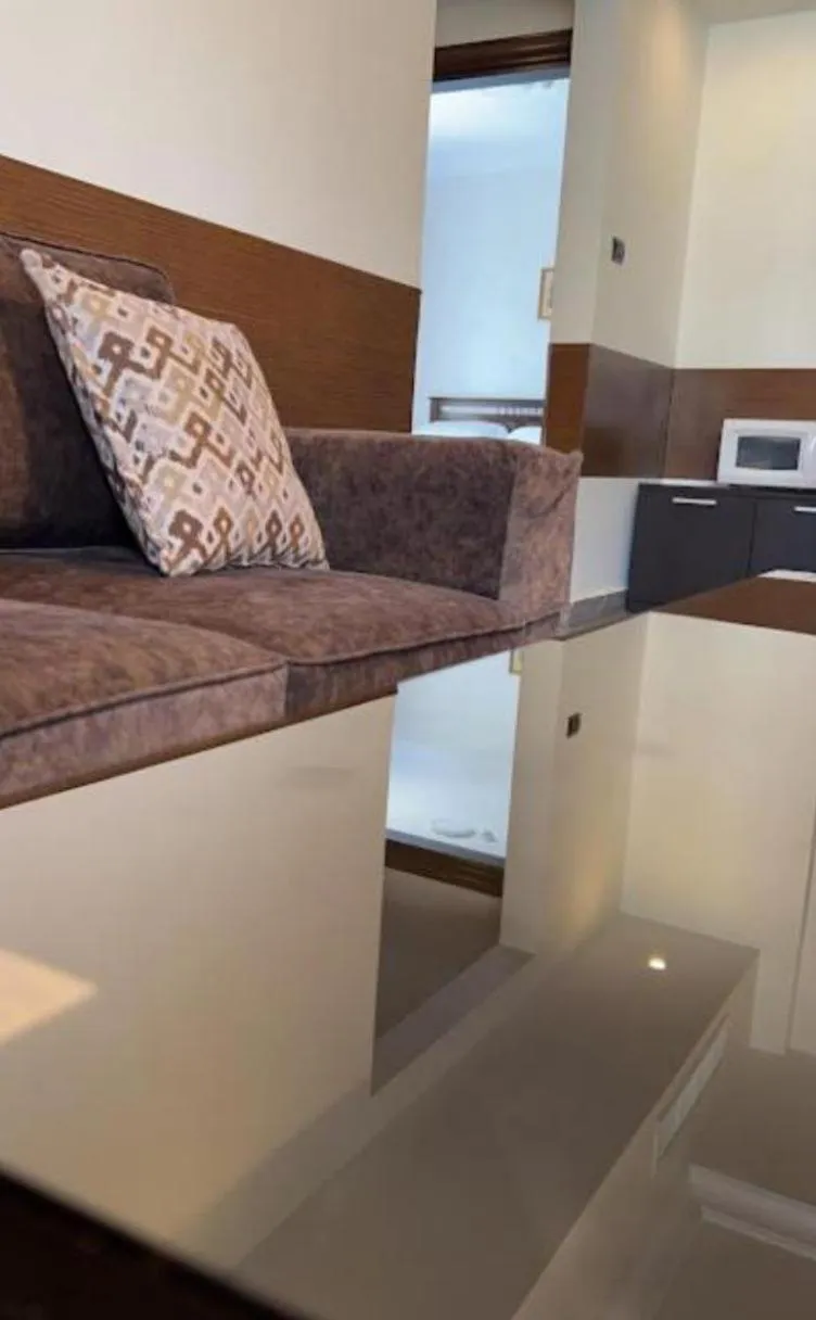 Living room in Tamrah Suites Hotel