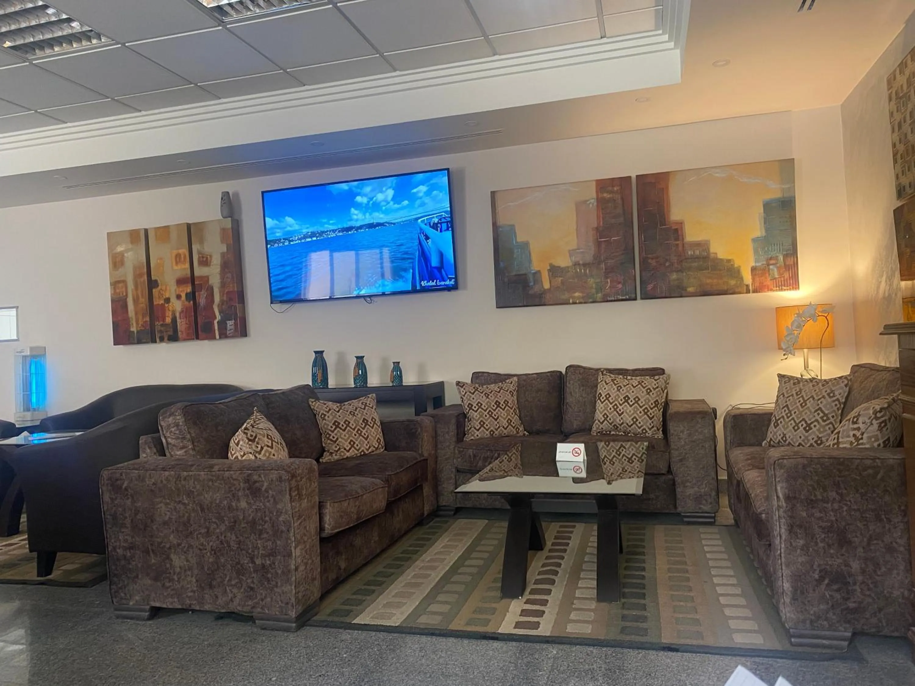 Lobby or reception in Tamrah Suites Hotel