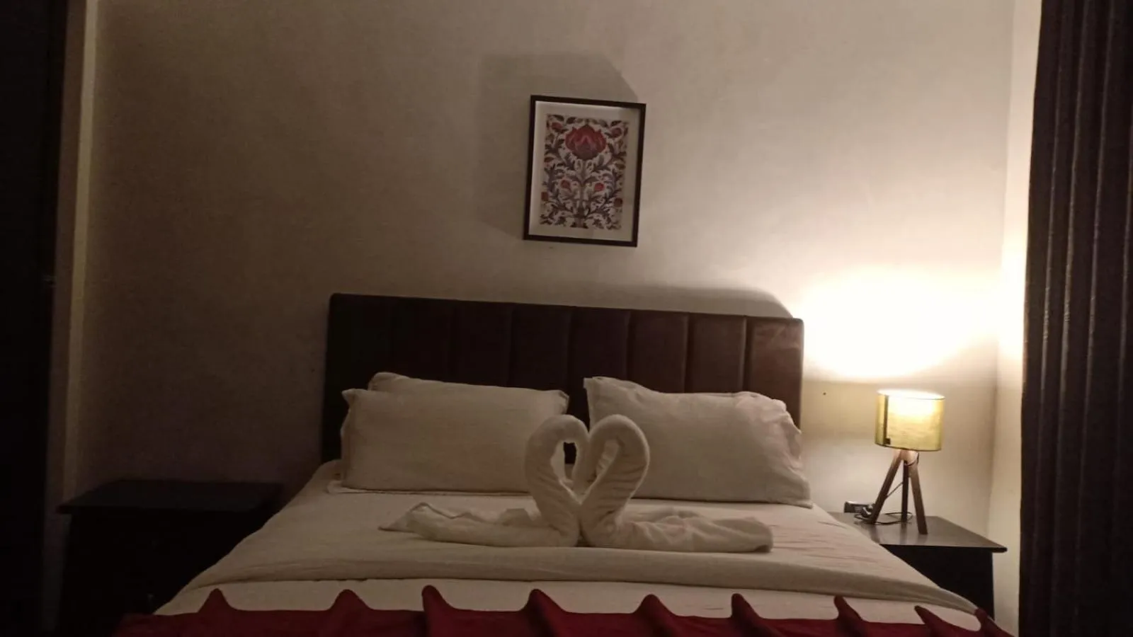 Bed in Tamrah Suites Hotel