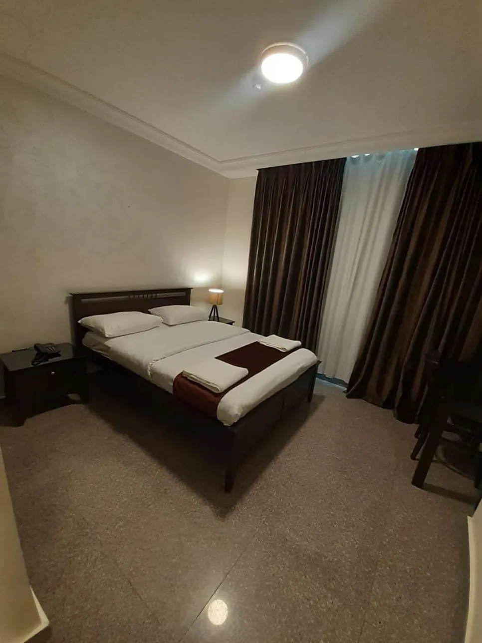 Bedroom in Tamrah Suites Hotel