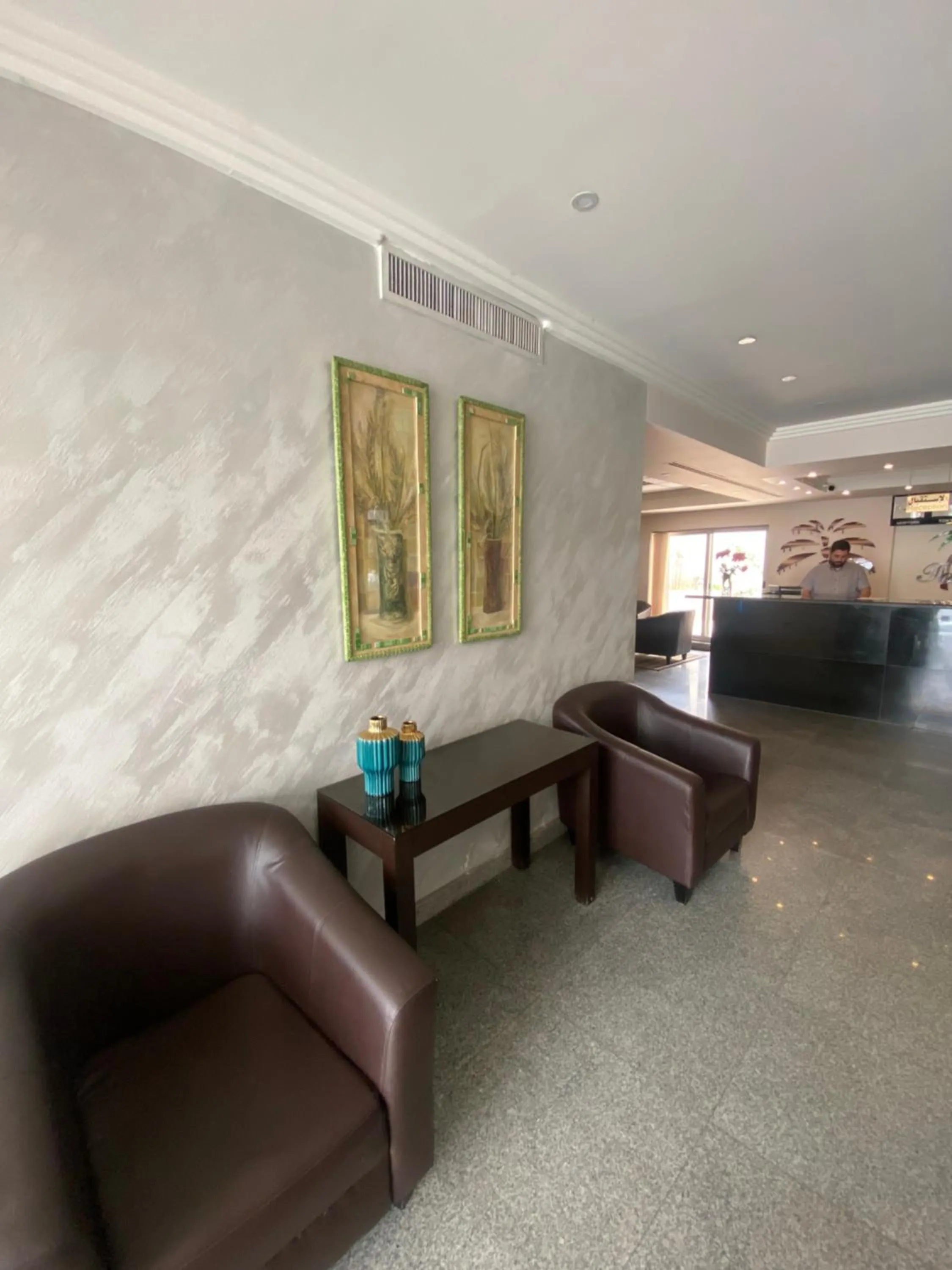 Lobby or reception in Tamrah Suites Hotel