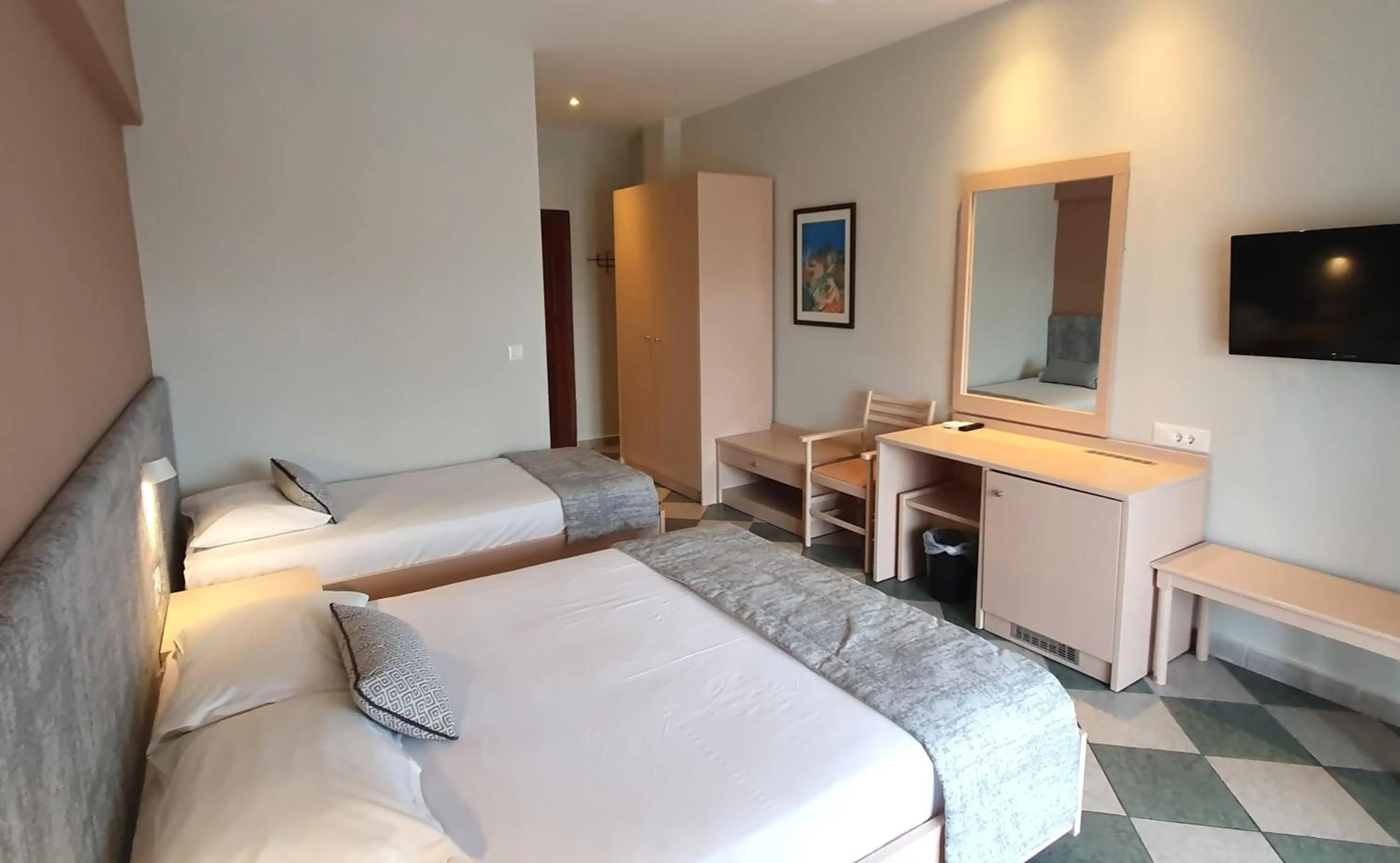 Bed in Palladium Hotel