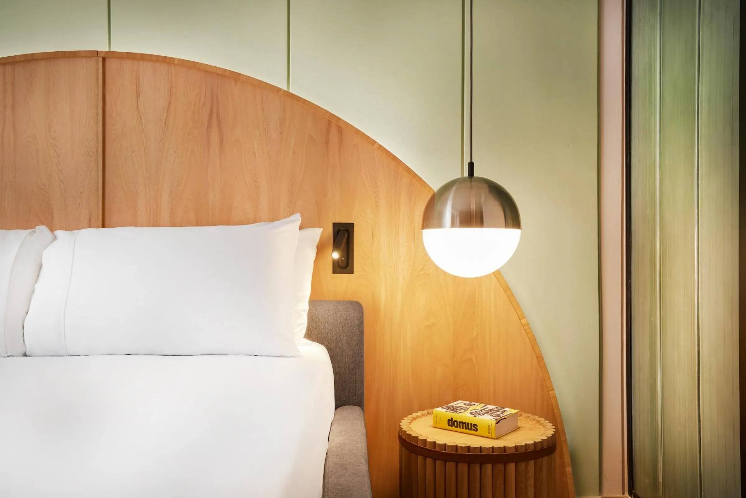 Bed in Wellcomm Spa & Hotel