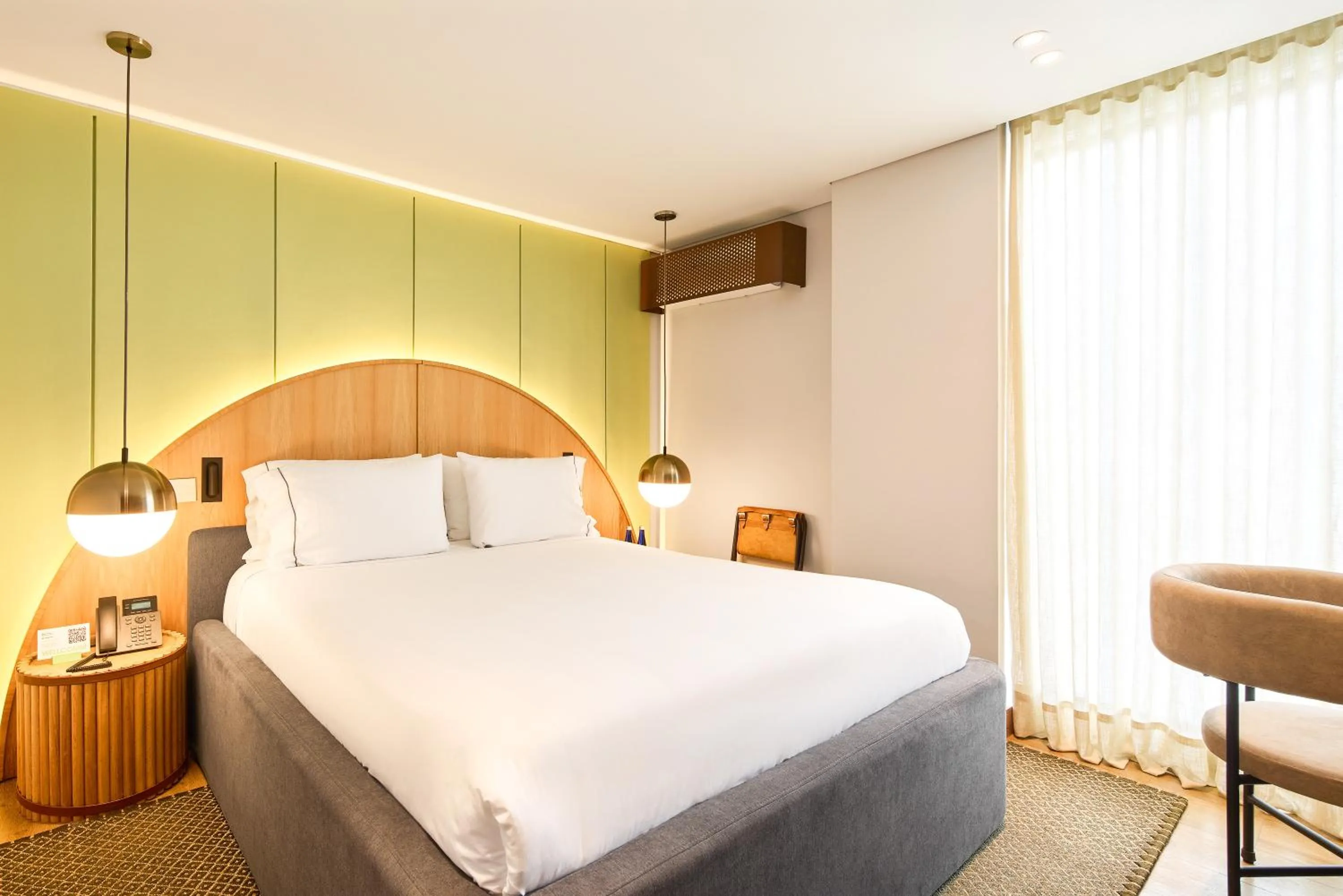 Bed in Wellcomm Spa & Hotel