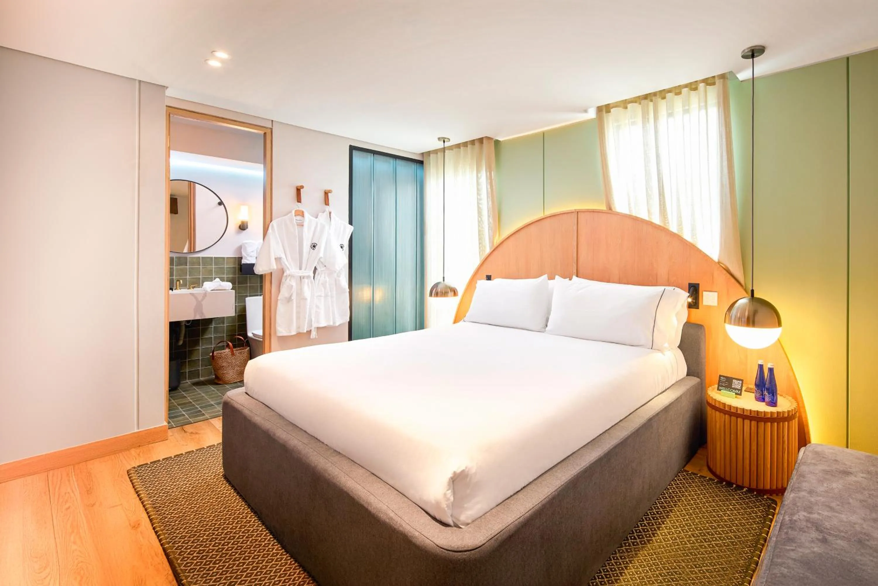 Bathroom, Bed in Wellcomm Spa & Hotel