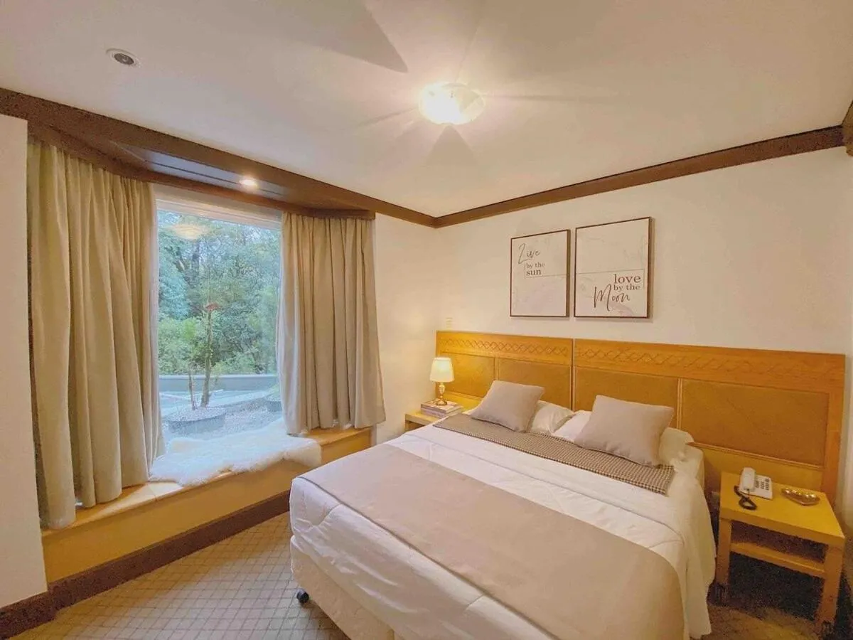 Bed in Luxuoso Studio 2007 Laje de Pedra Gramado Canela