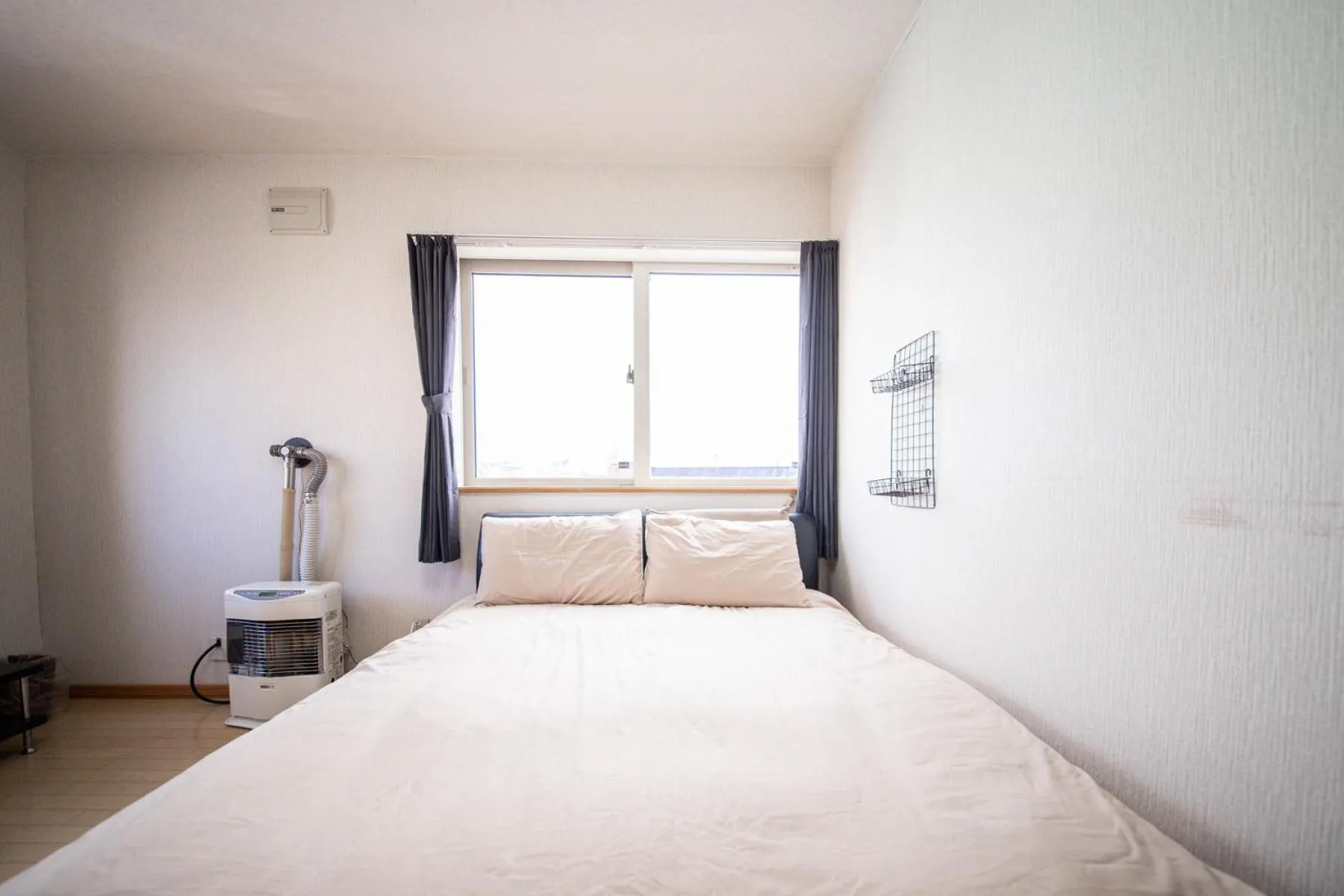 Bed in Sumiyoshi House Room B