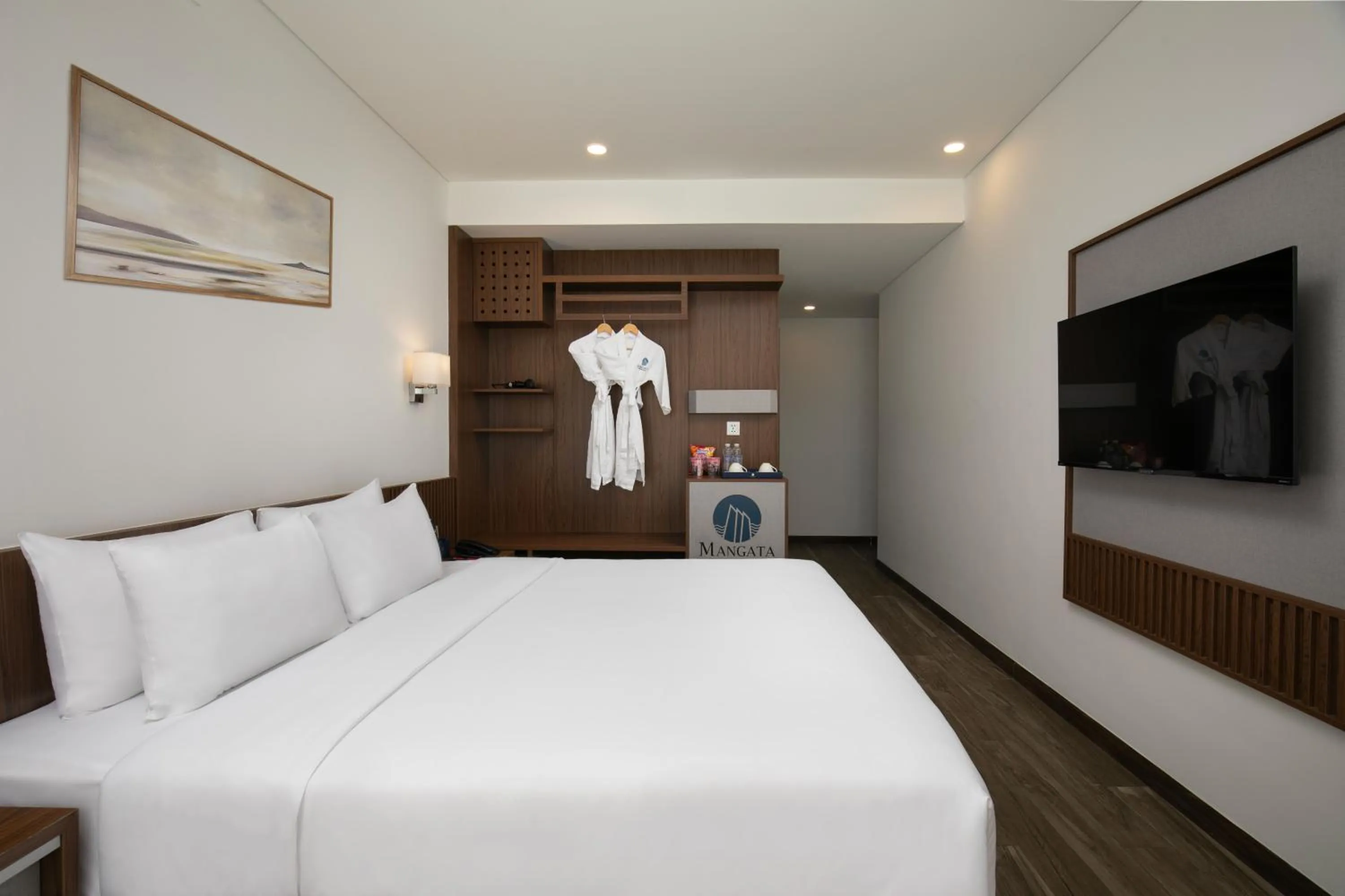 Bedroom, Bed in Mangata Beachfront Hotel - Rooftop Bar Sea View