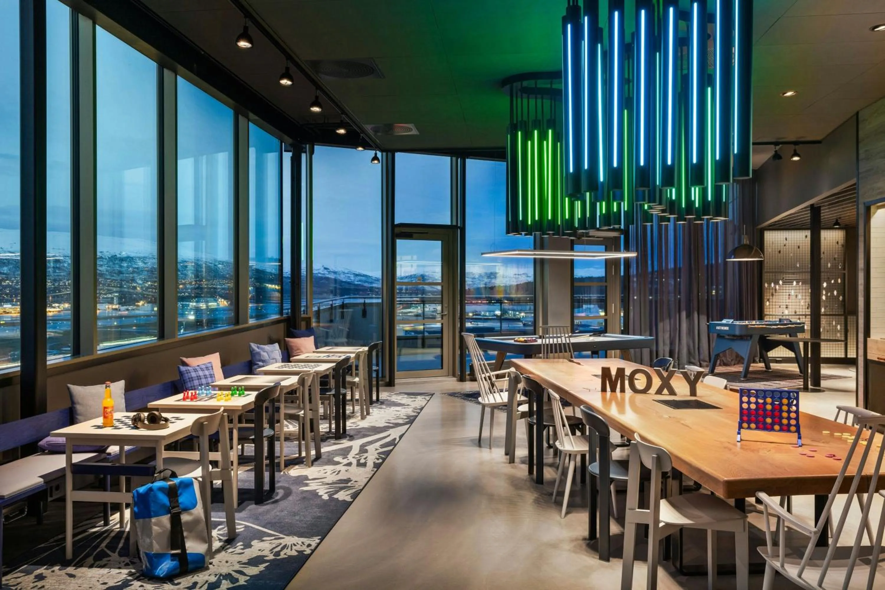 Lounge or bar in Moxy Tromso
