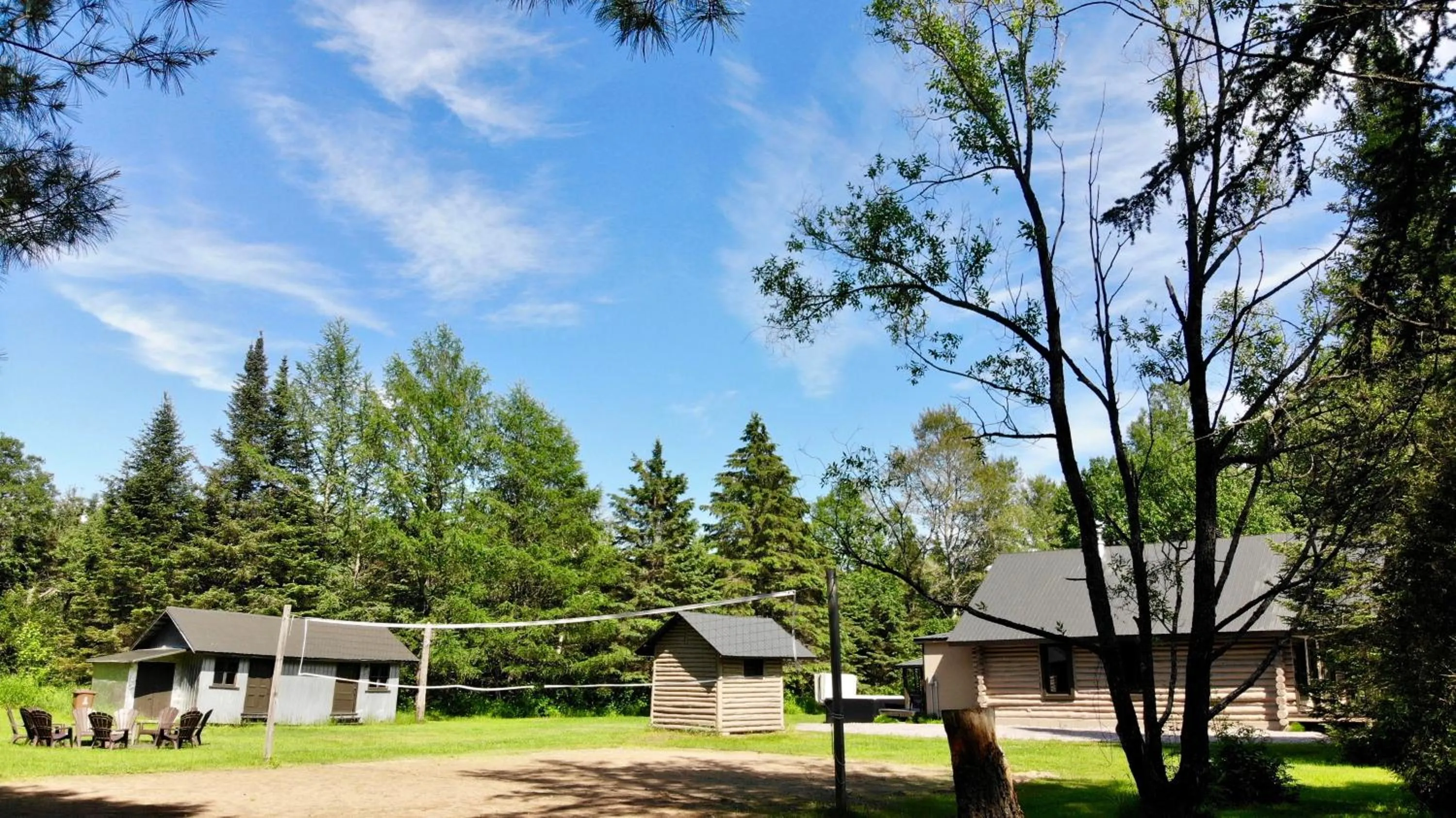 Garden view in Les Chalets Tourisma - Chalet en bois rond avec spa - Chalet du 4e