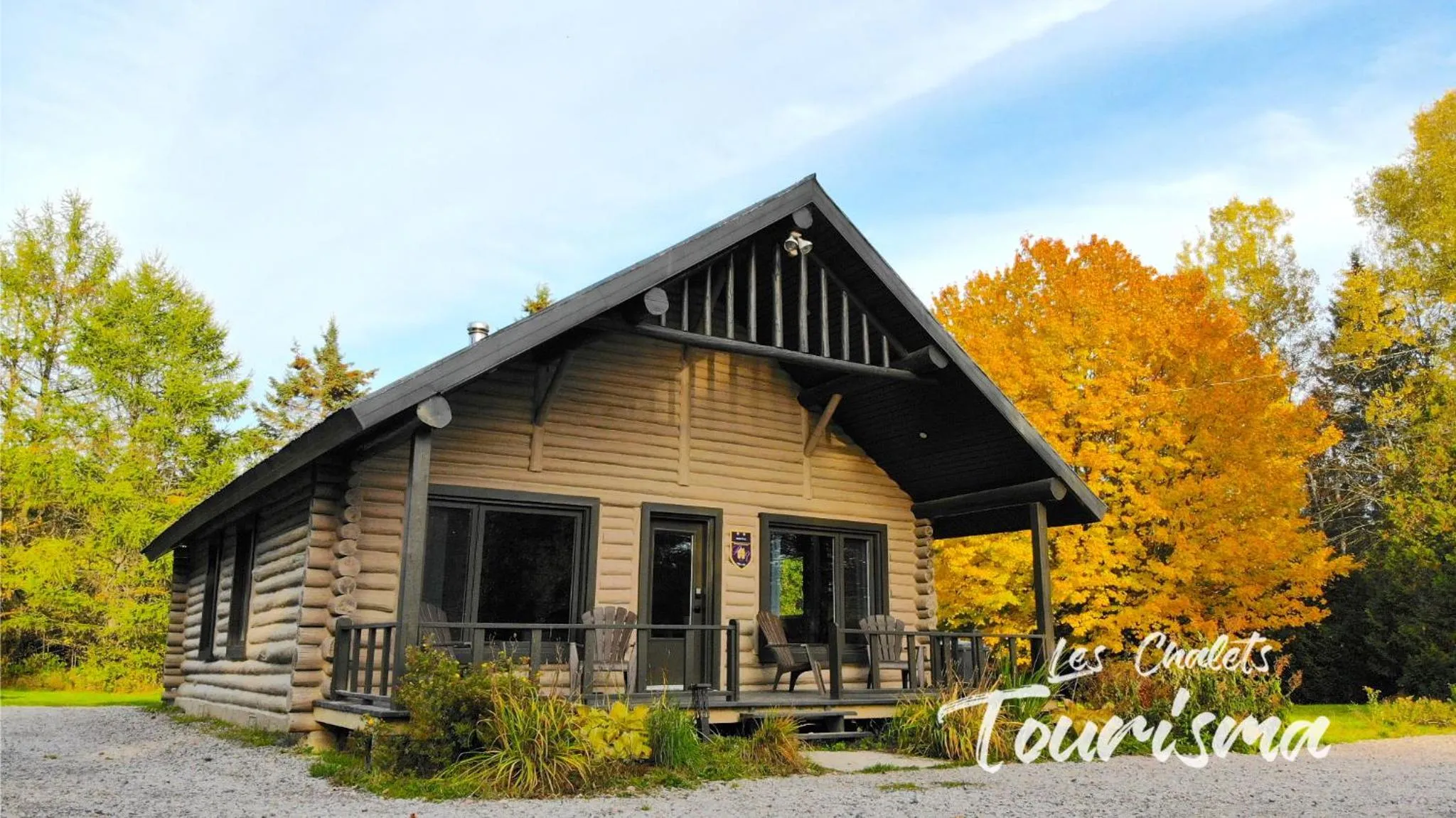 Property building in Les Chalets Tourisma - Chalet en bois rond avec spa - Chalet du 4e