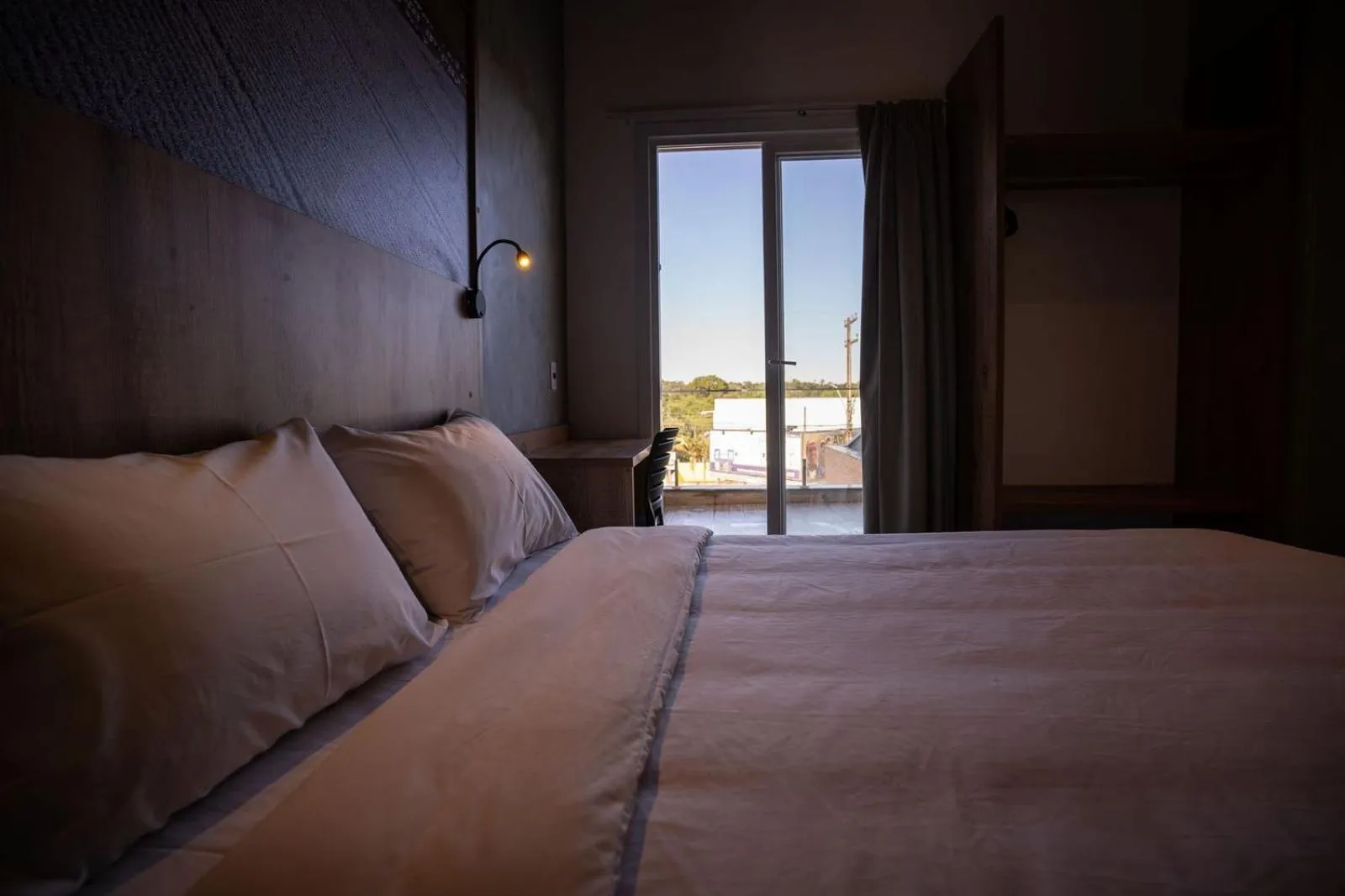 Photo of the whole room, Bed in CAMPOS DE HOLAMBRA INN