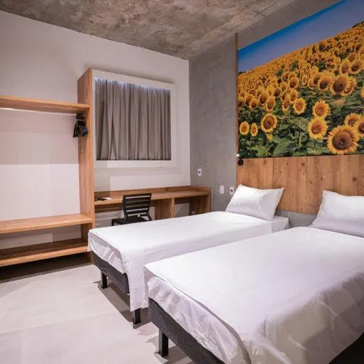 Photo of the whole room, Bed in CAMPOS DE HOLAMBRA INN