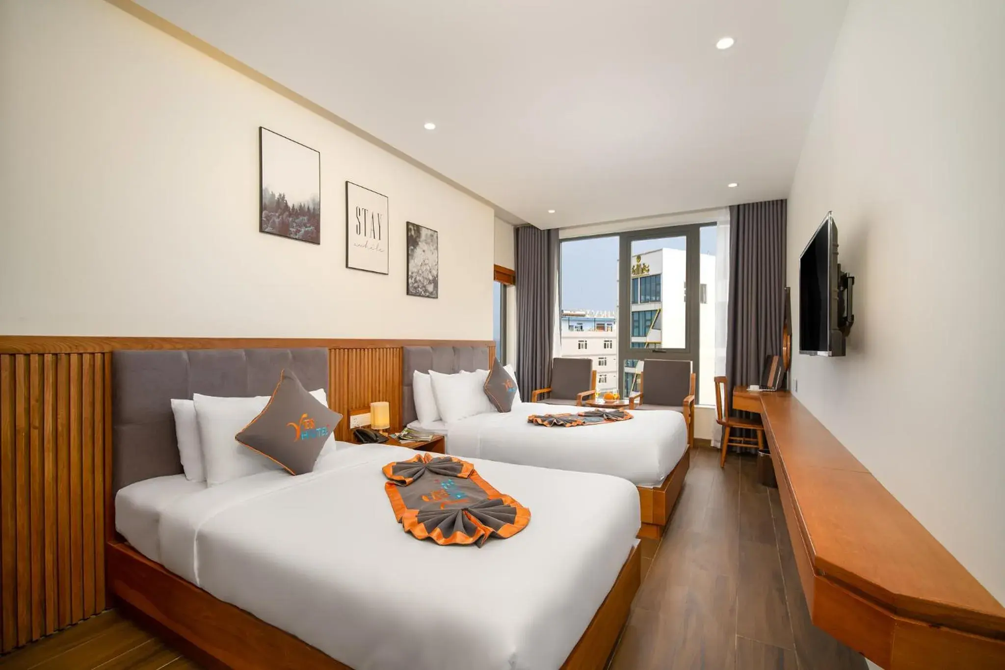 Quadruple Room with Sea View in Yes Hotel Đà Nẵng Quadruple Room with Sea View in Yes Hotel Đà Nẵng