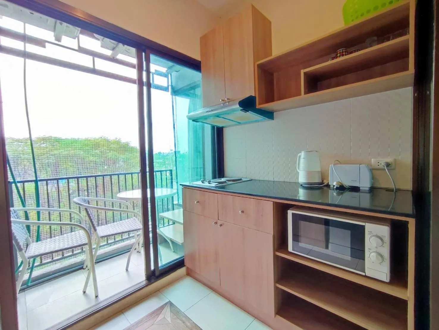 stove in Deluxe Rooms by Suwan Style Agency