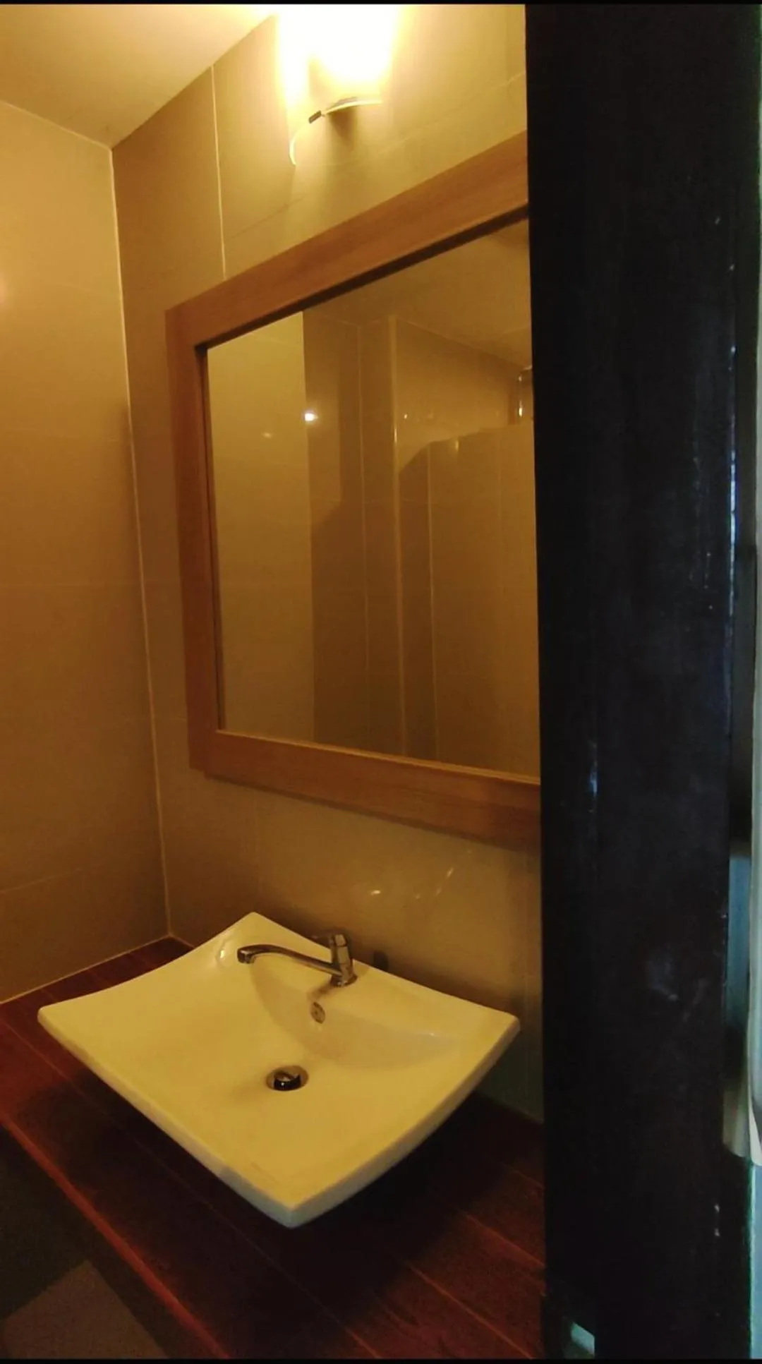 Bathroom in Deluxe Rooms by Suwan Style Agency