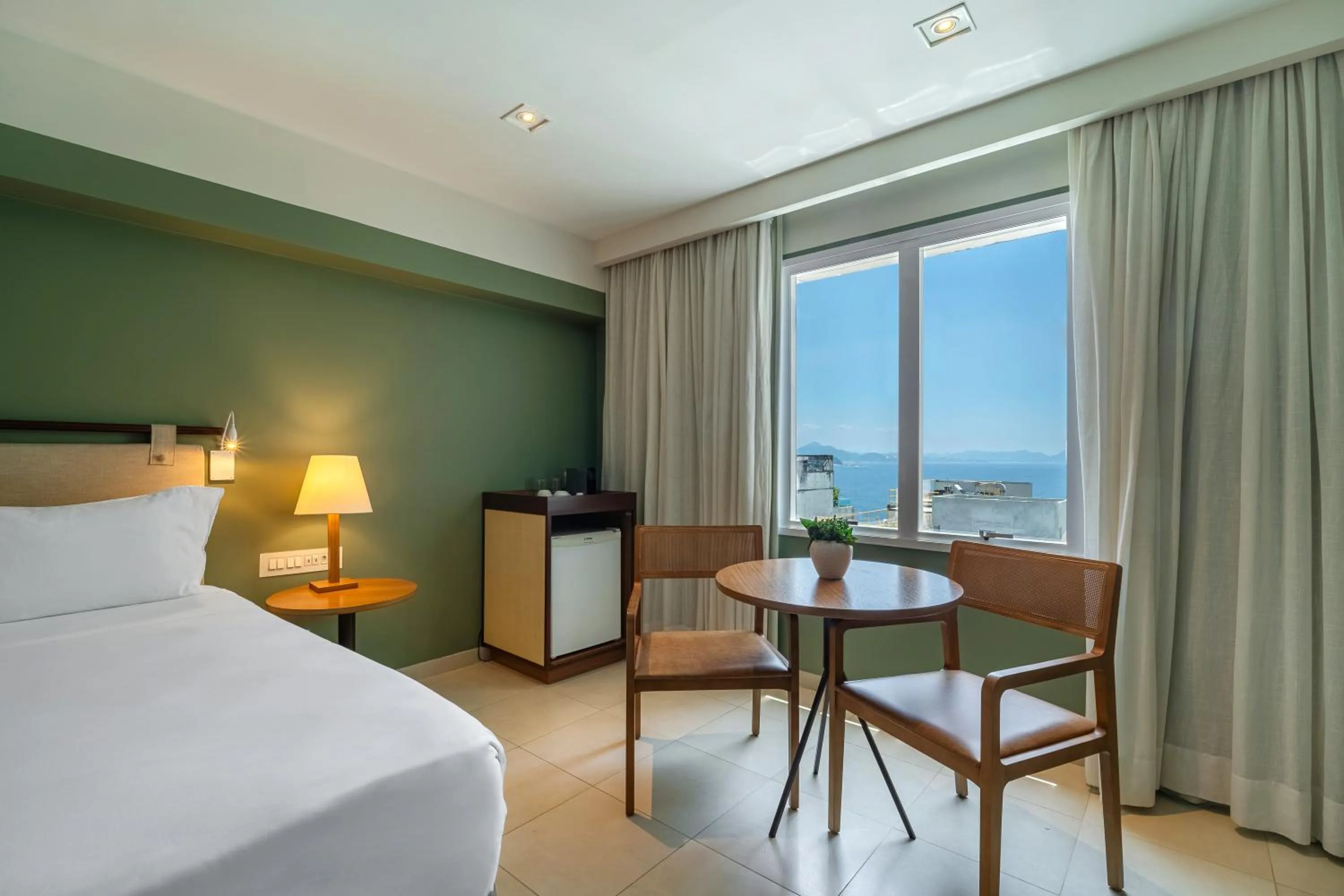 View (from property/room), Bed in Grand Mercure Rio de Janeiro Copacabana