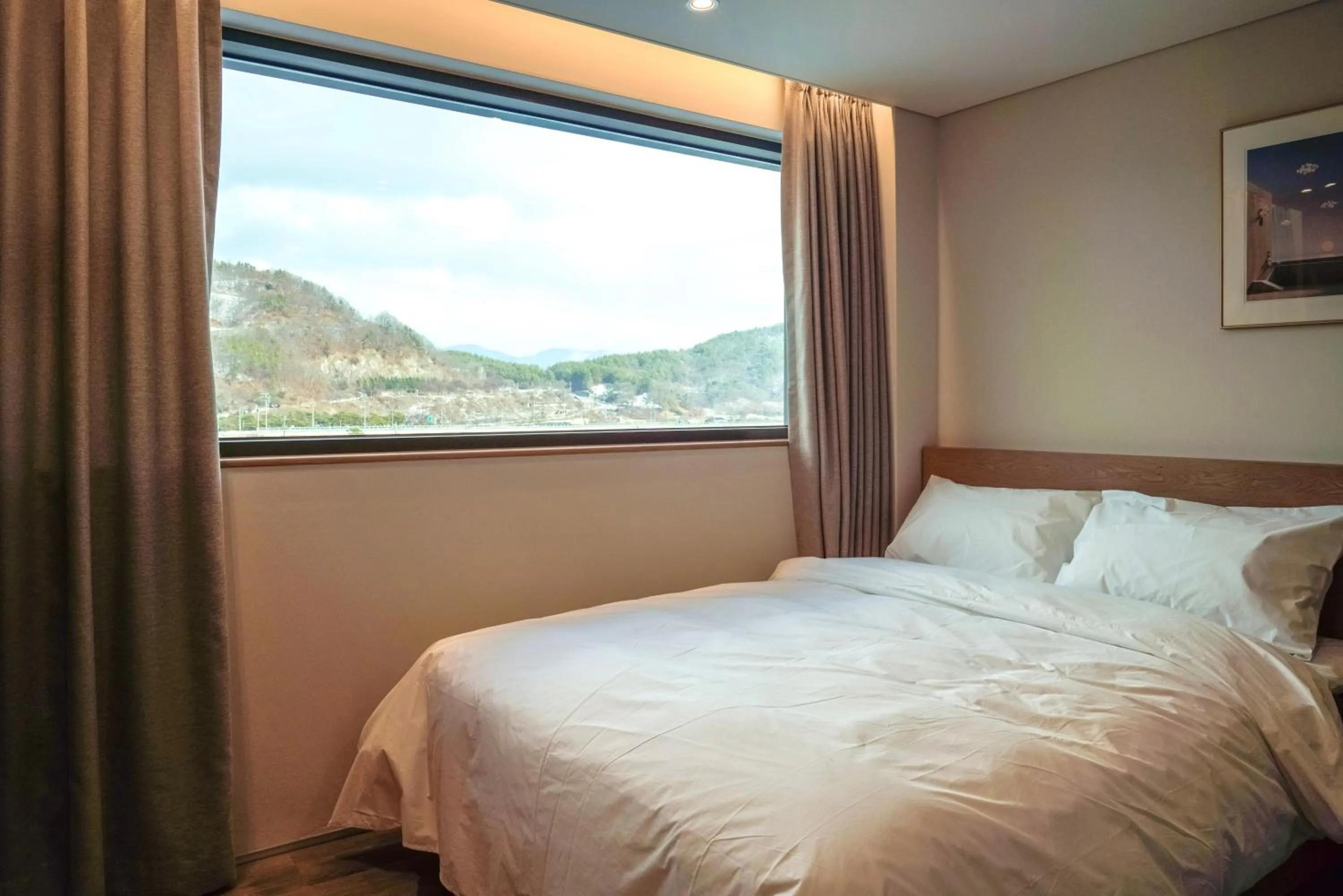 Bed in Eden Foret Hotel