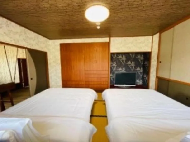 Bed in HOTEL COCOA RESORT