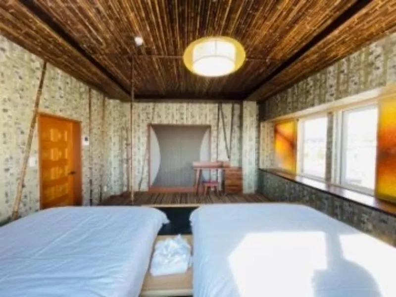 Bed in HOTEL COCOA RESORT