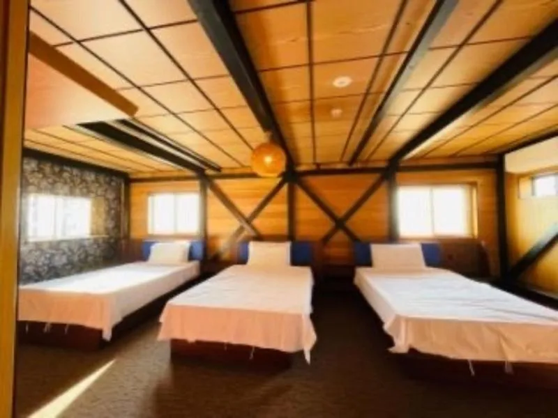 Bed in HOTEL COCOA RESORT