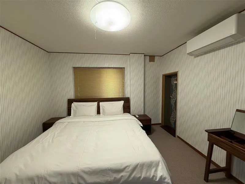 Bed in HOTEL COCOA RESORT