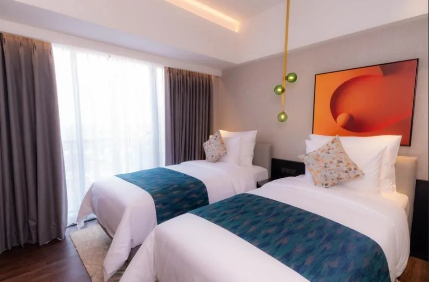 Bed in Herloom Hotel & Residence BSD Tangerang
