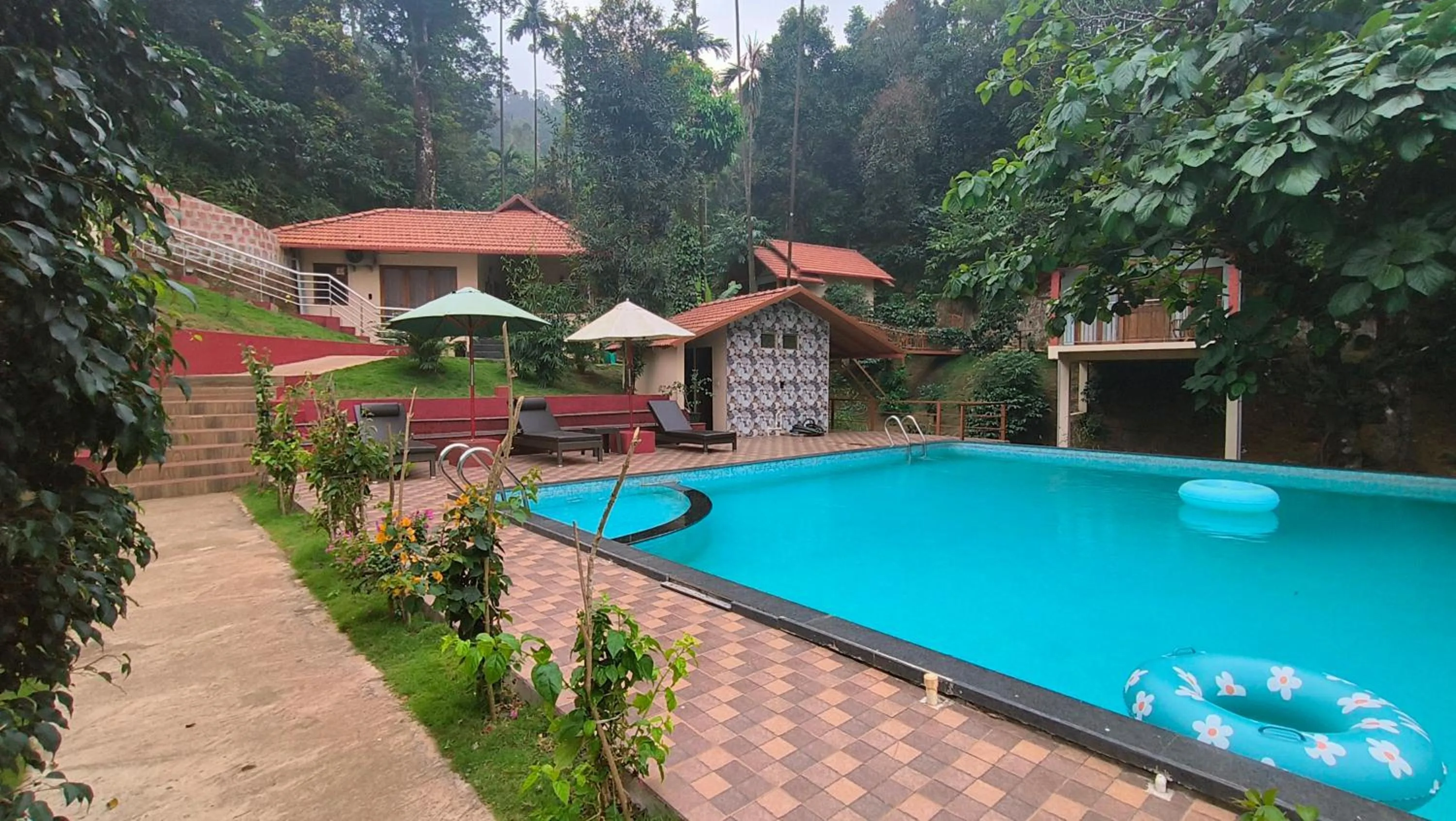Swimming pool in Hill Crest Resort - Coorg