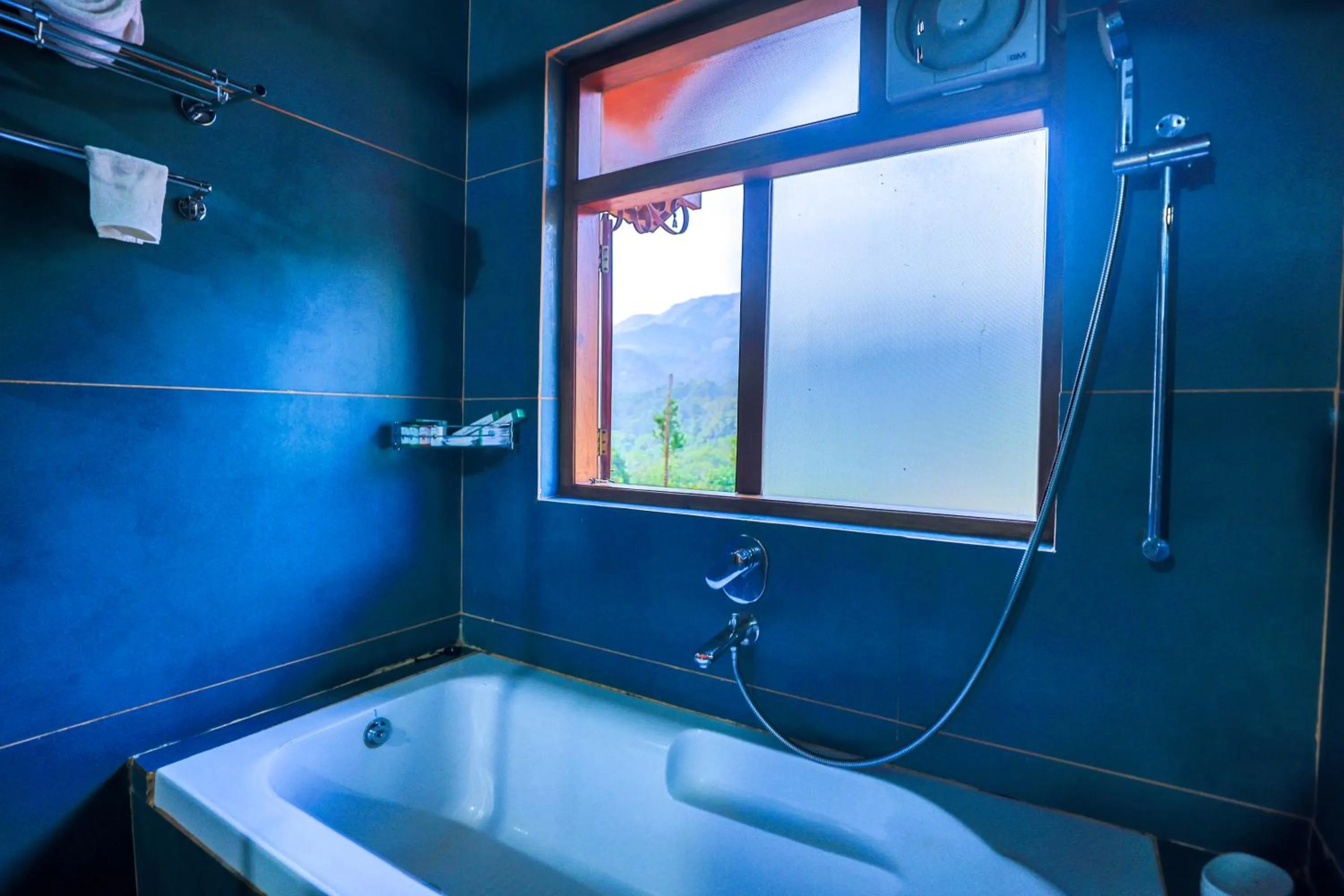 Bath in Hill Crest Resort - Coorg